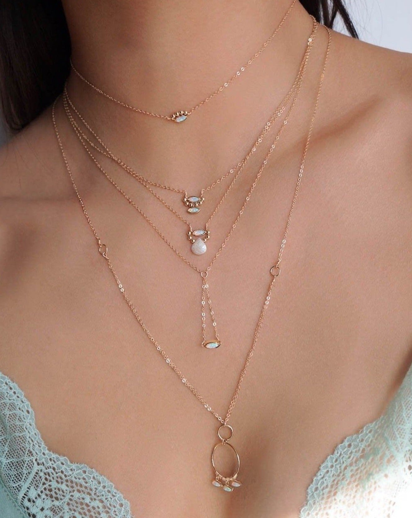 Alastar Necklace by KOZAKH. A 16 to 18 inch adjustable length necklace in 14K Gold Filled, featuring Marquise Opal charms and 2mm Gold Filled balls.