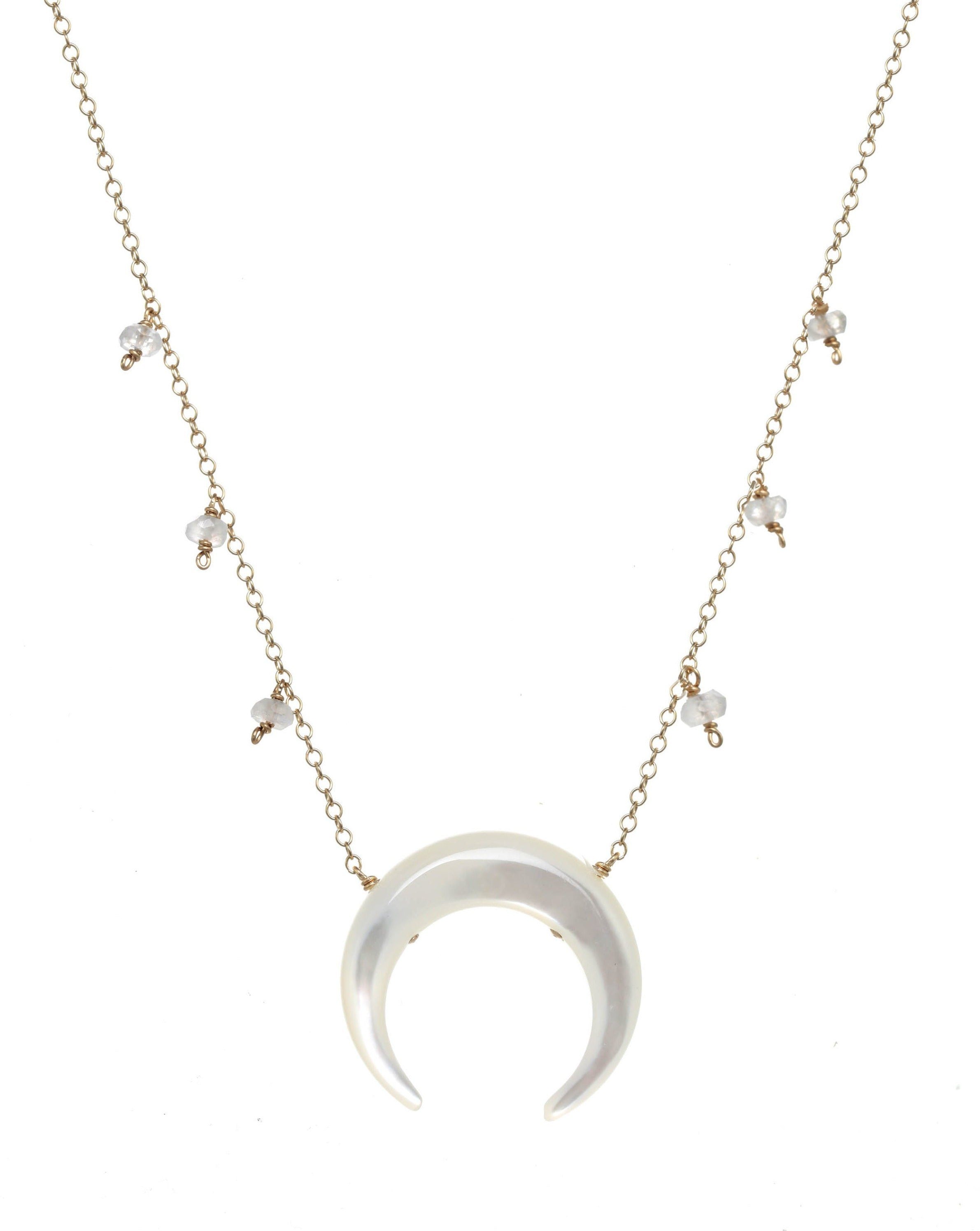 Baque Moon Necklace by KOZAKH. A 16 to 18 inch adjustable length necklace in 14K Gold Filled, featuring a 20mm hand-carved Mother of Pearl moon charm and 2mm faceted Moonstones.