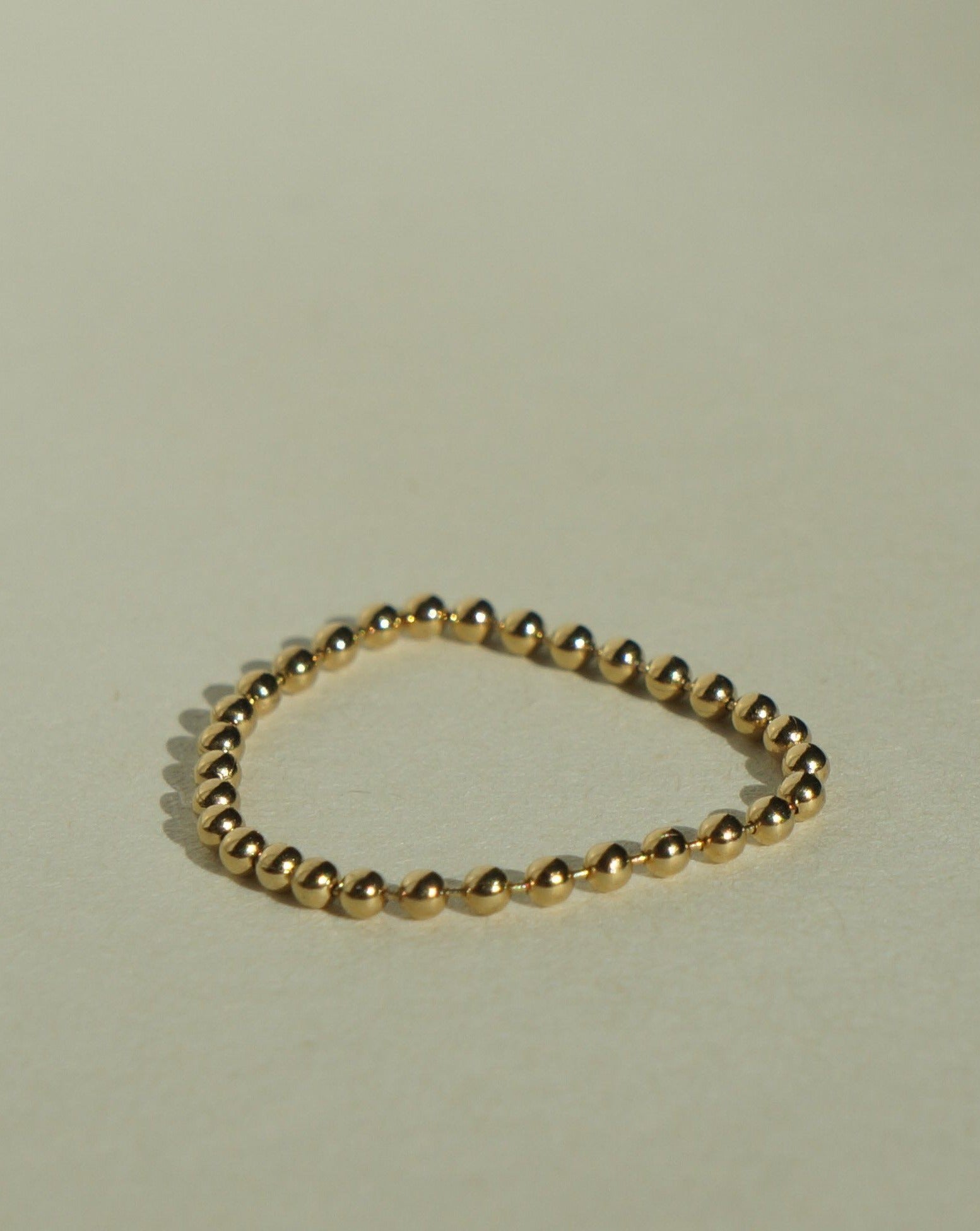 Beaded Soft Chain Ring by KOZAKH. A beaded soft chain ring, crafted in 14K Gold Filled.