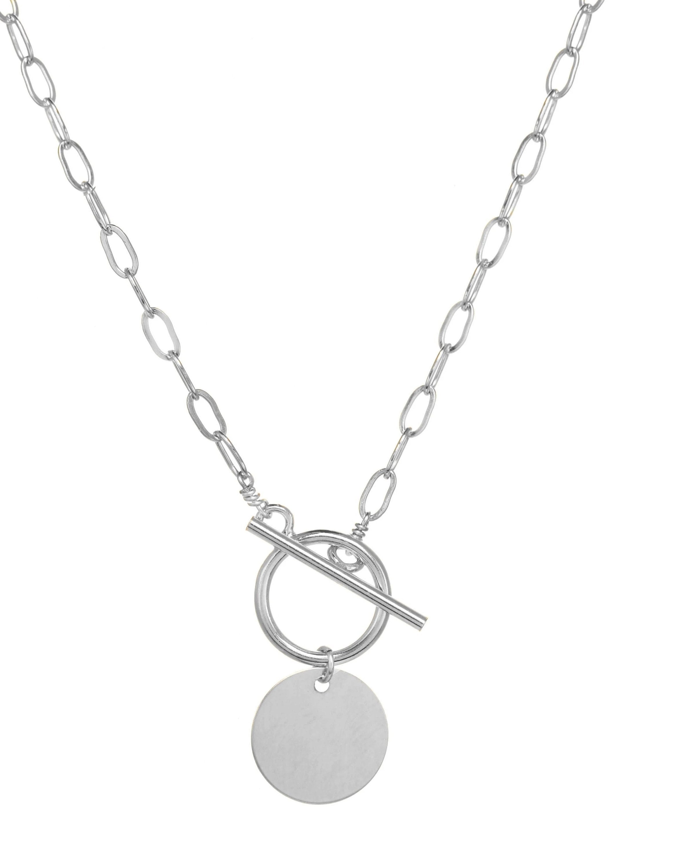 Cappa Necklace by KOZAKH. A 16 to 18 inch adjustable length necklace in Sterling Silver, featuring a coin charm.