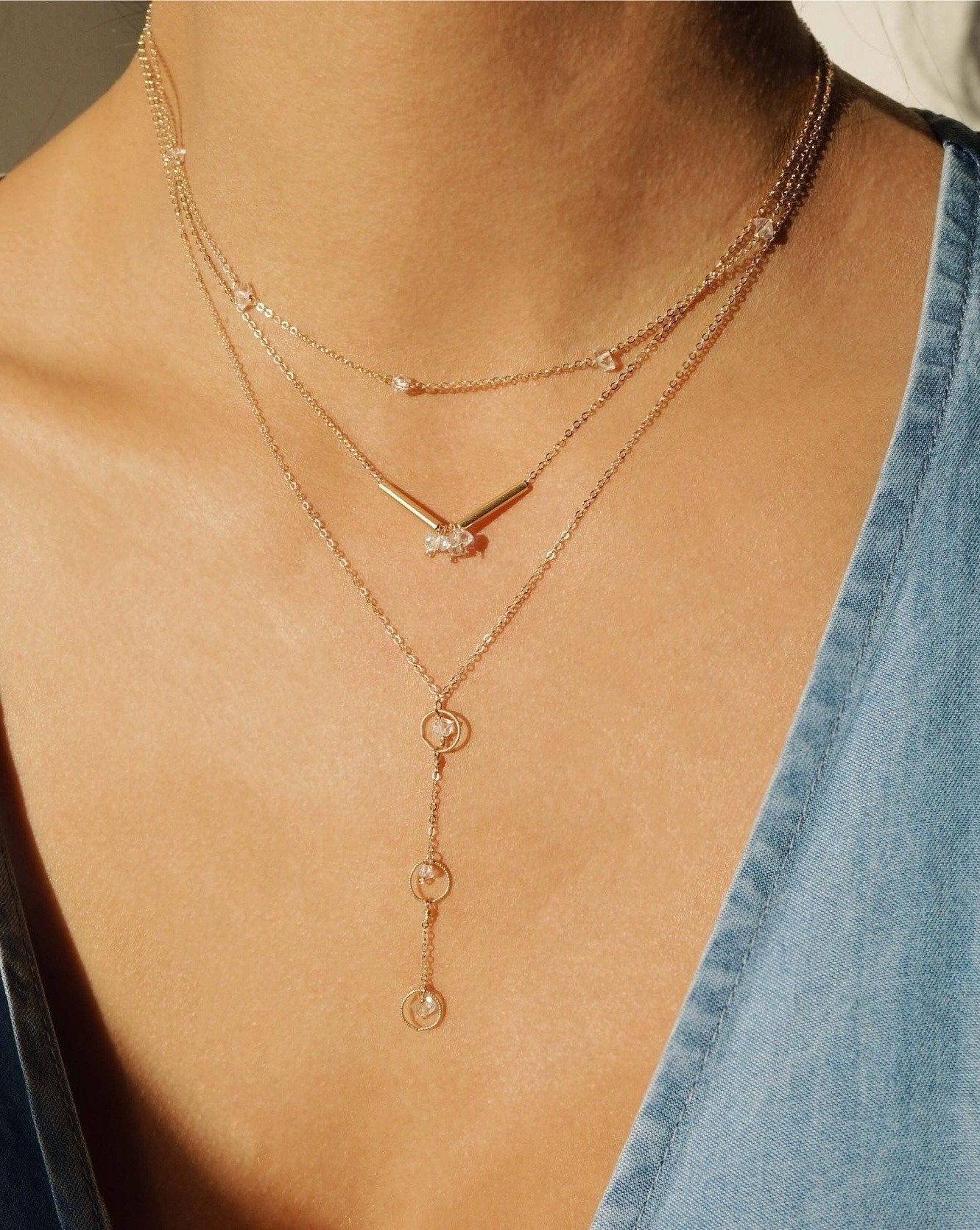 Cinq Herkimer Necklace by KOZAKH. A 16 inch long necklace in 14K Gold Filled, featuring Herkimer Diamonds.