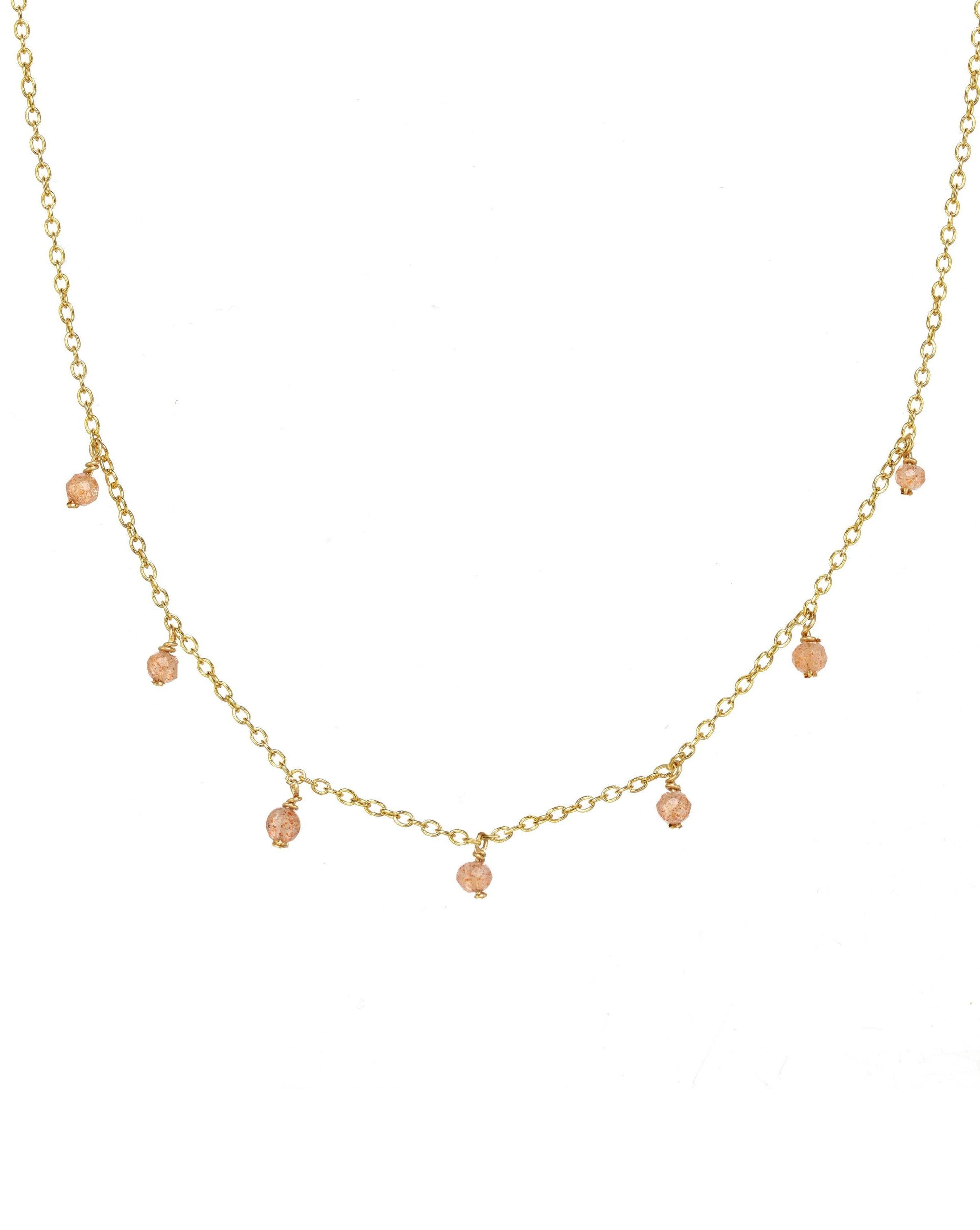 Cuy Necklace by KOZAKH. A 16 to 18 inch adjustable length necklace in 14K Gold Filled, featuring 2mm faceted round Peach Moonstones.