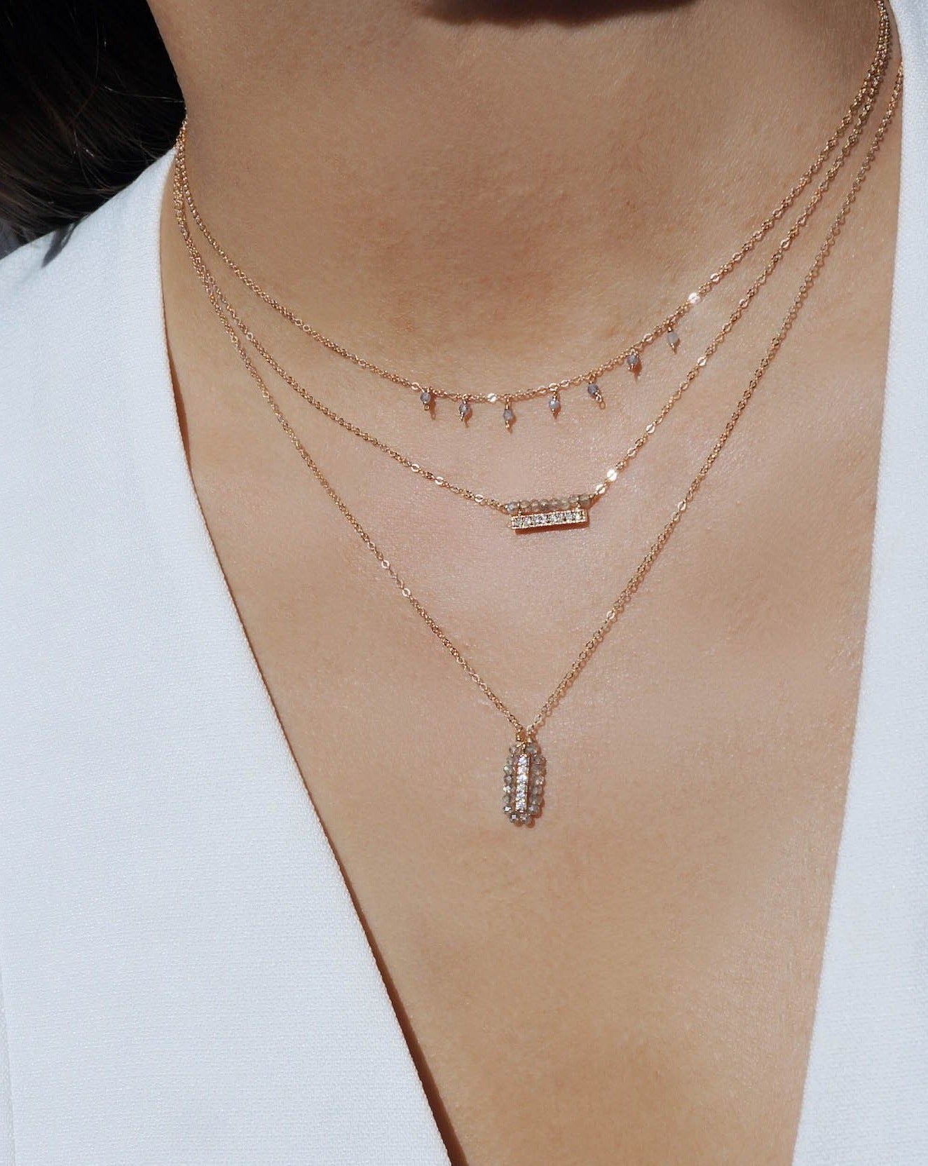 Cuy Necklace by KOZAKH. A 16 to 18 inch adjustable length necklace in 14K Gold Filled, featuring 2mm faceted round Tanzanite gems.