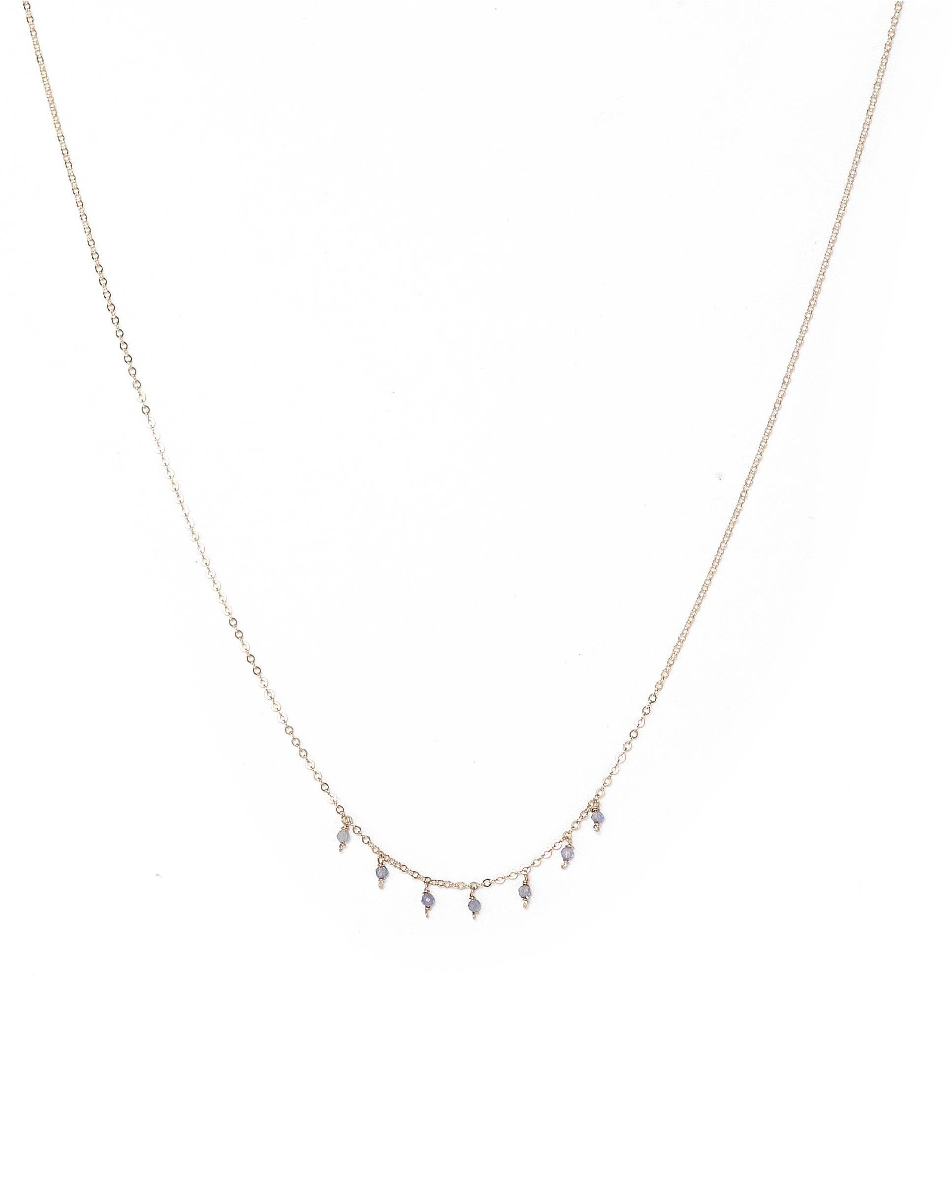 Cuy Necklace by KOZAKH. A 16 to 18 inch adjustable length necklace in 14K Gold Filled, featuring 2mm faceted round Tanzanite gems.