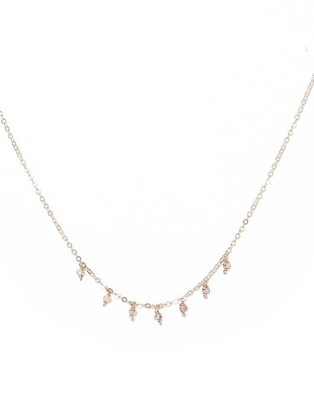 Cuy Necklace by KOZAKH. A 16 to 18 inch adjustable length necklace in 14K Gold Filled, featuring 2mm faceted round Cherry Quartz gems.