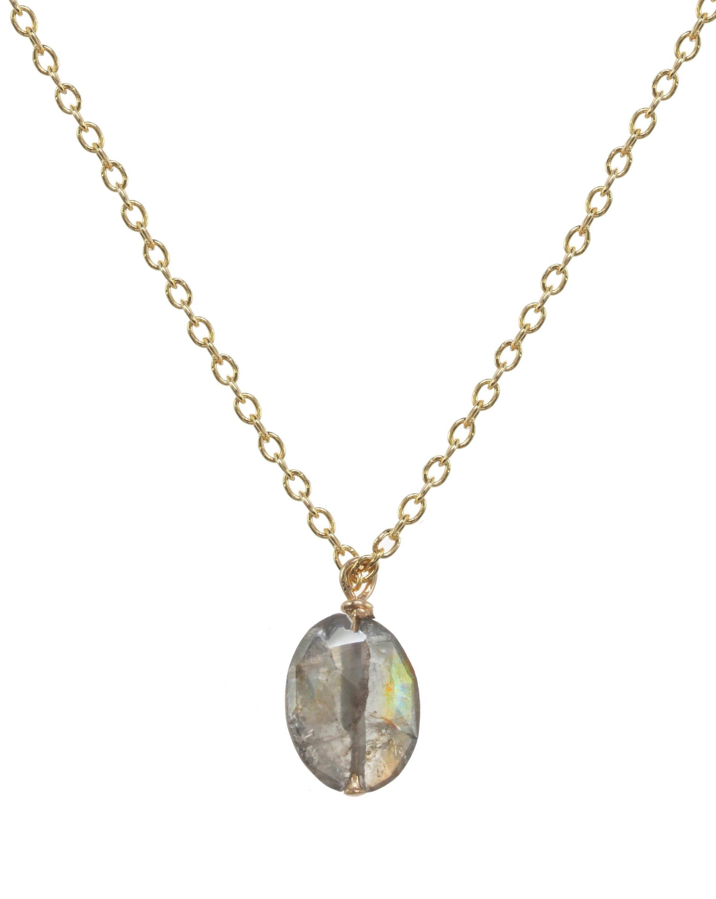 Dia Necklace by KOZAKH. A 16 to 18 inch adjustable length necklace in 14K Gold Filled, featuring a faceted Sapphire.