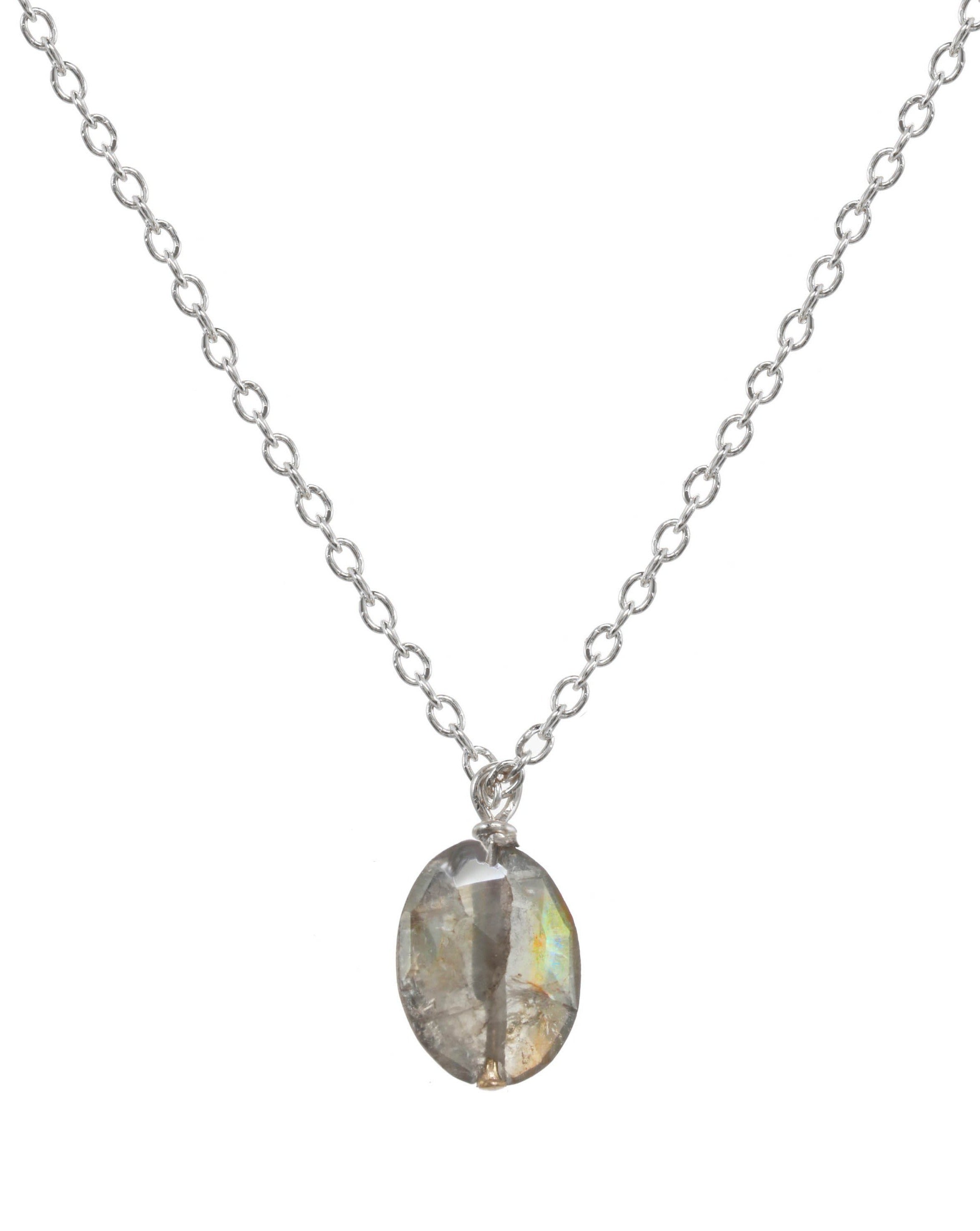 Dia Necklace by KOZAKH. A 16 to 18 inch adjustable length necklace in Sterling Silver, featuring a faceted Sapphire.