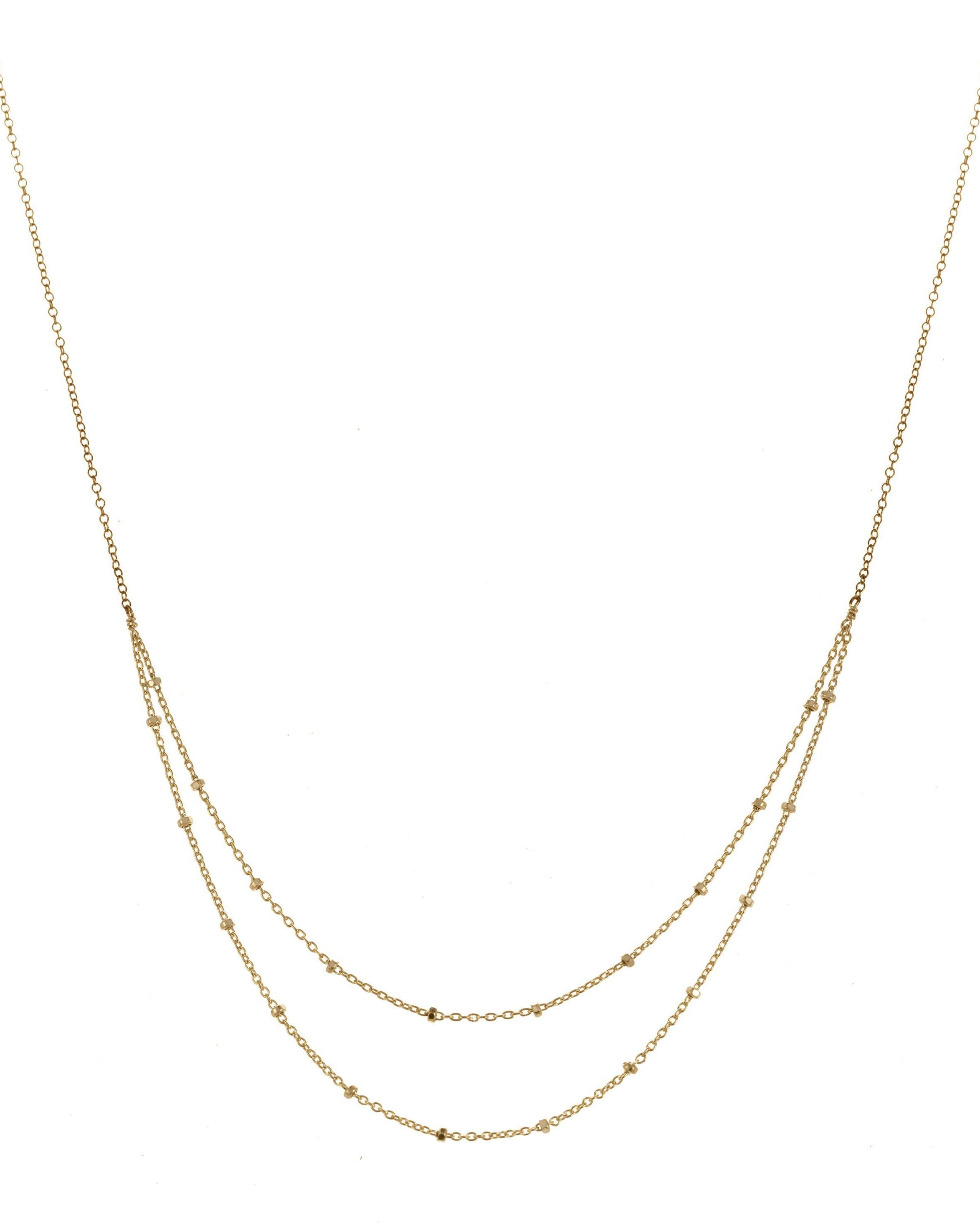Dolmas Necklace by KOZAKH. A 16 to 18 inch adjustable length double chain style necklace in 14K Gold Filled, featuring sterling silver balls.