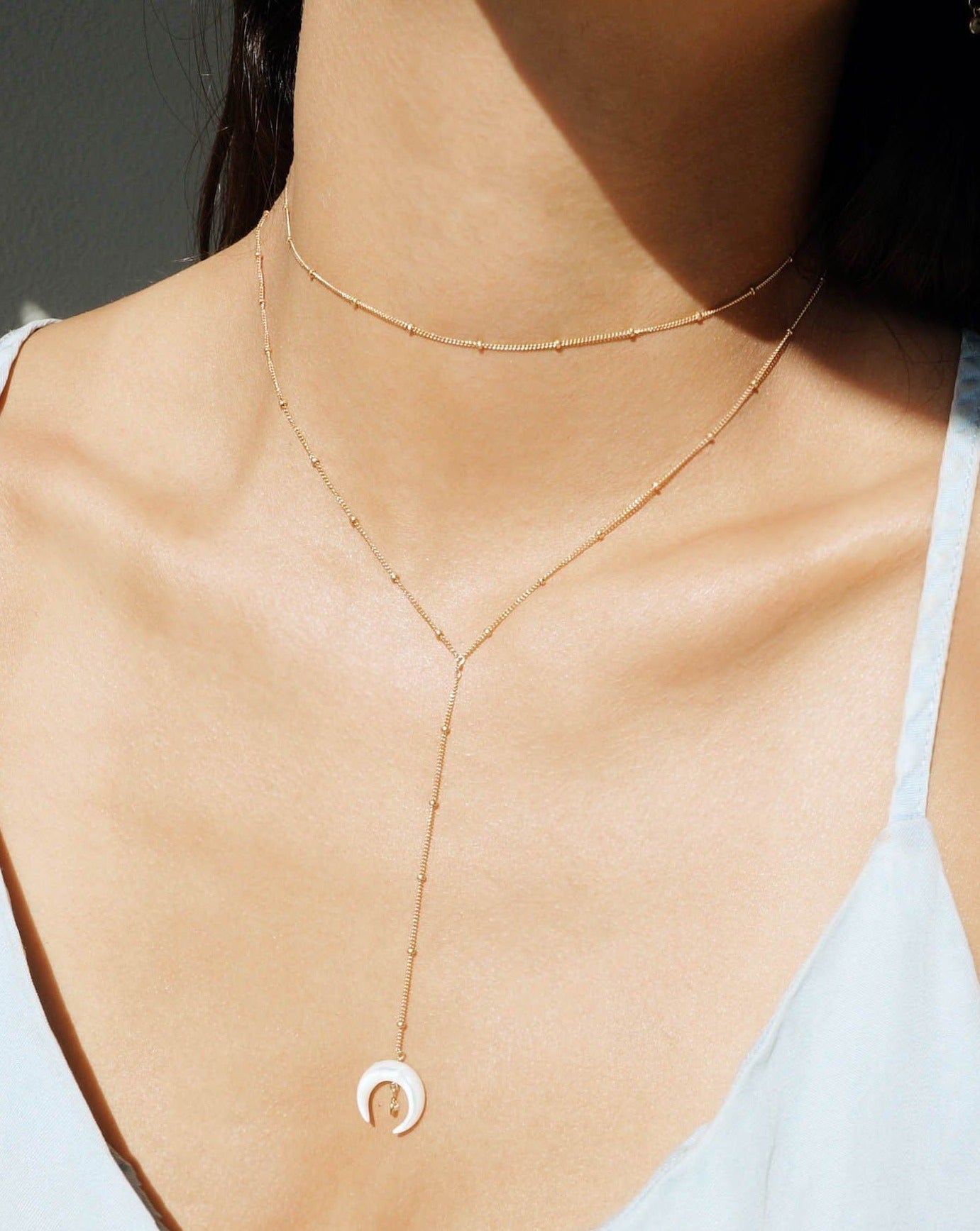 Dots Choker by KOZAKH. A 12 to 14 inch adjustable length necklace in 14K Gold Filled, featuring a 1mm curb chain with balls design.