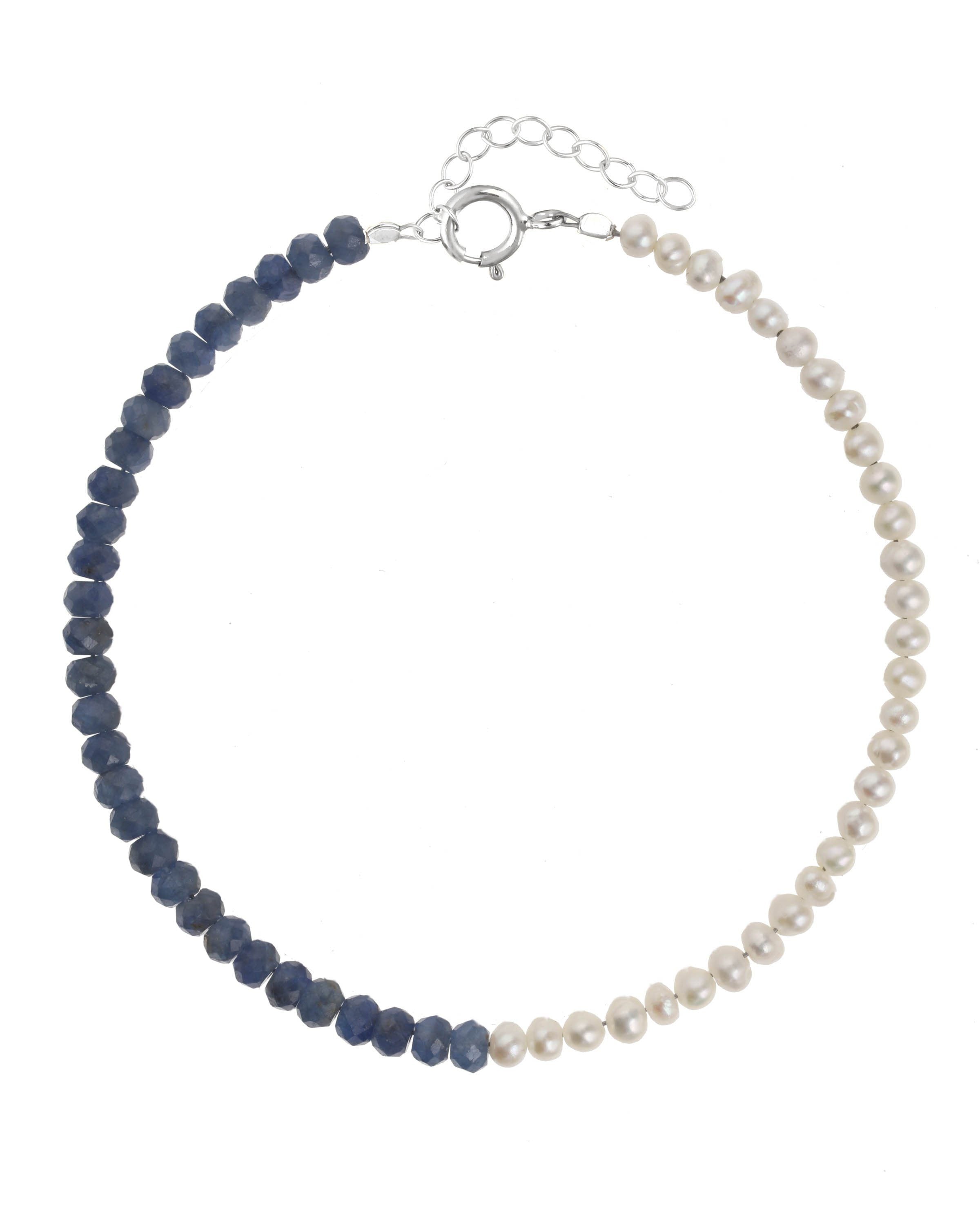 Elo Bracelet by KOZAKH. A 6 to 7 inch adjustable length bracelet, crafted in Sterling Silver. Half of the bracelet strand features 3.5mm Freshwater Pearls and 3.5mm Faceted Sapphire beads on the other half.
