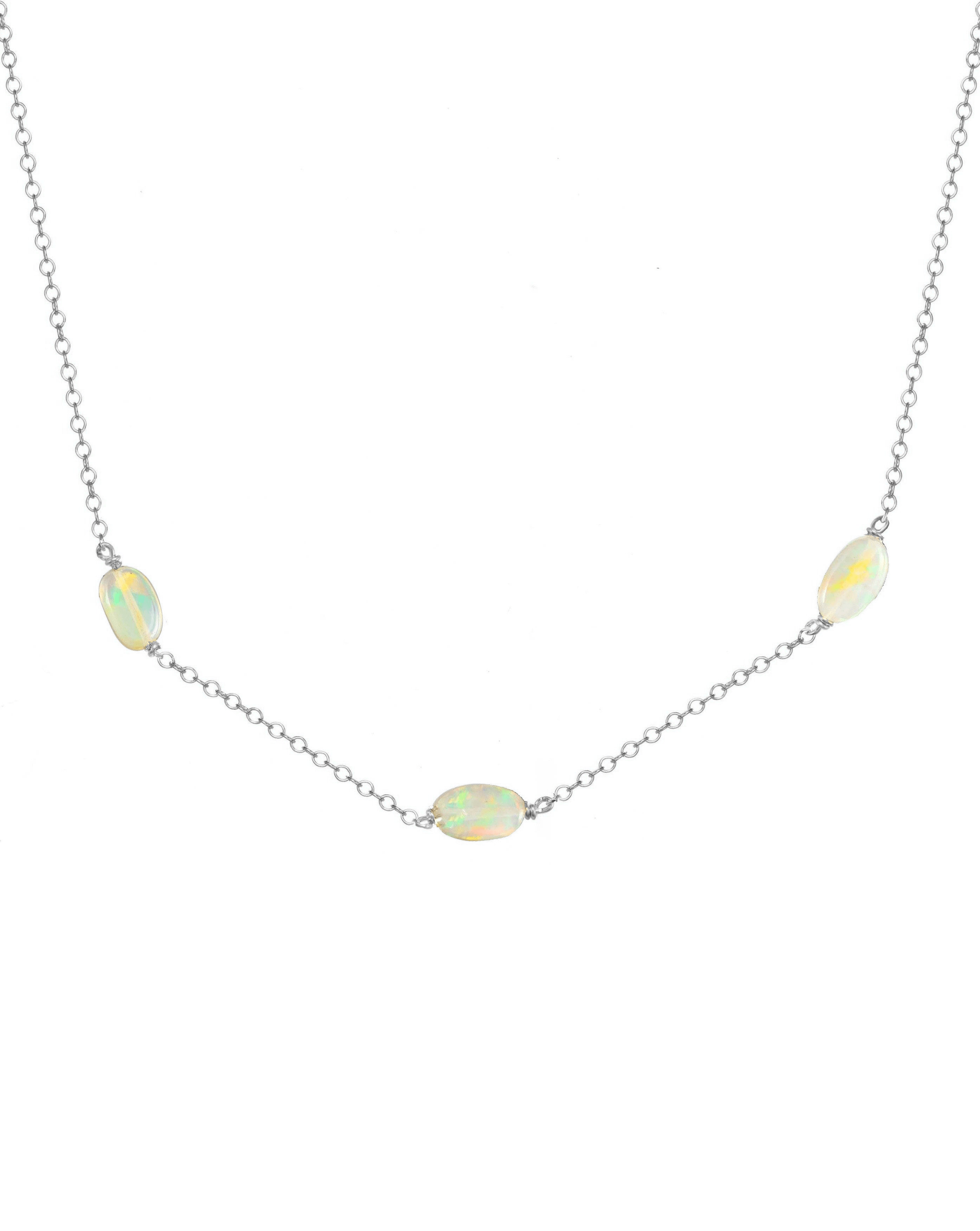 Erin Fire Necklace by KOZAKH. A 16 to 18 inch adjustable length necklace in Sterling Silver, featuring 4mm to 5mm smooth Fire Opal gems.