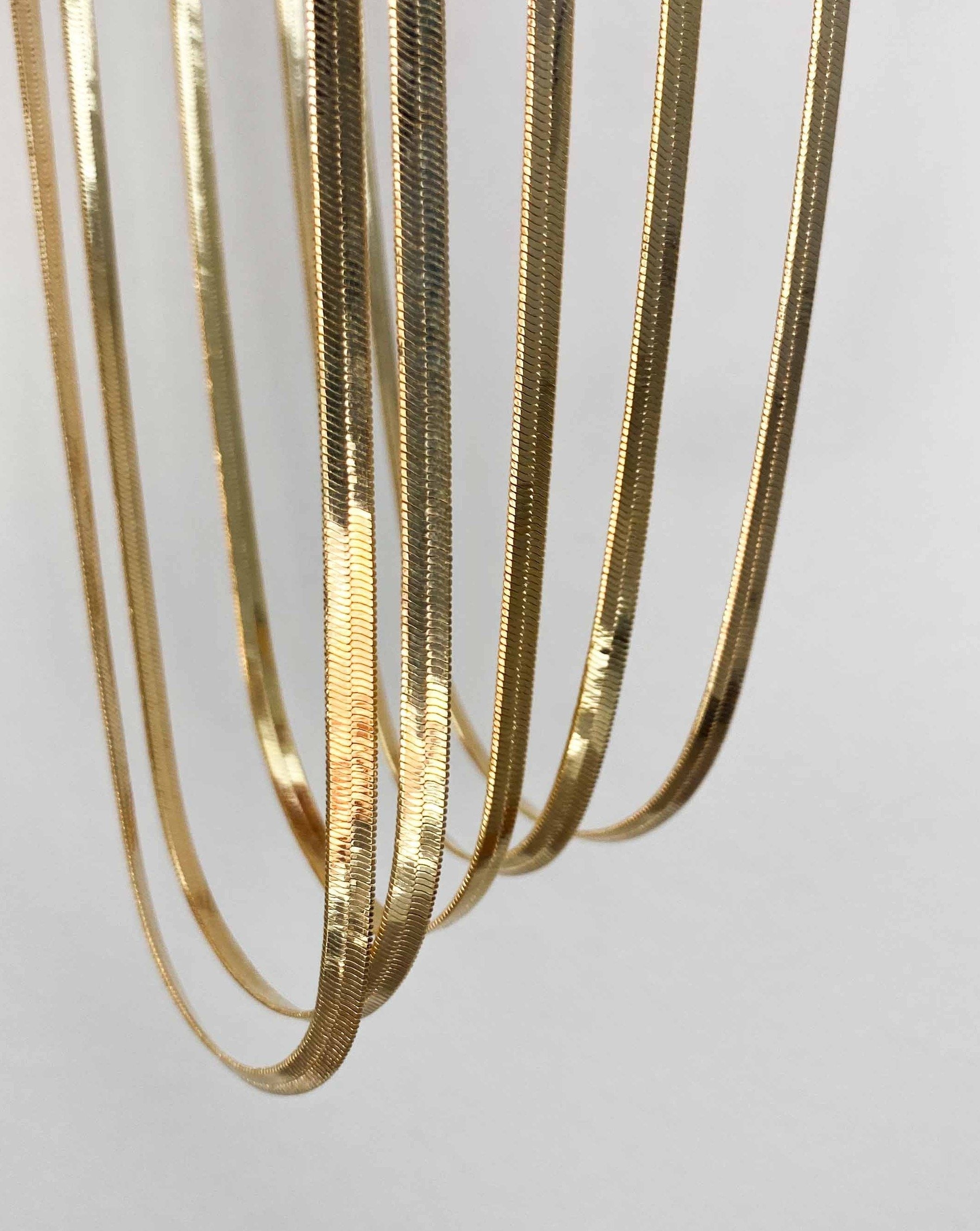 Fanez Necklace by KOZAKH. A 16 inch long, 3mm thick Herringbone Chain necklace in 18k Gold Bonded with anti-tarnish coating.