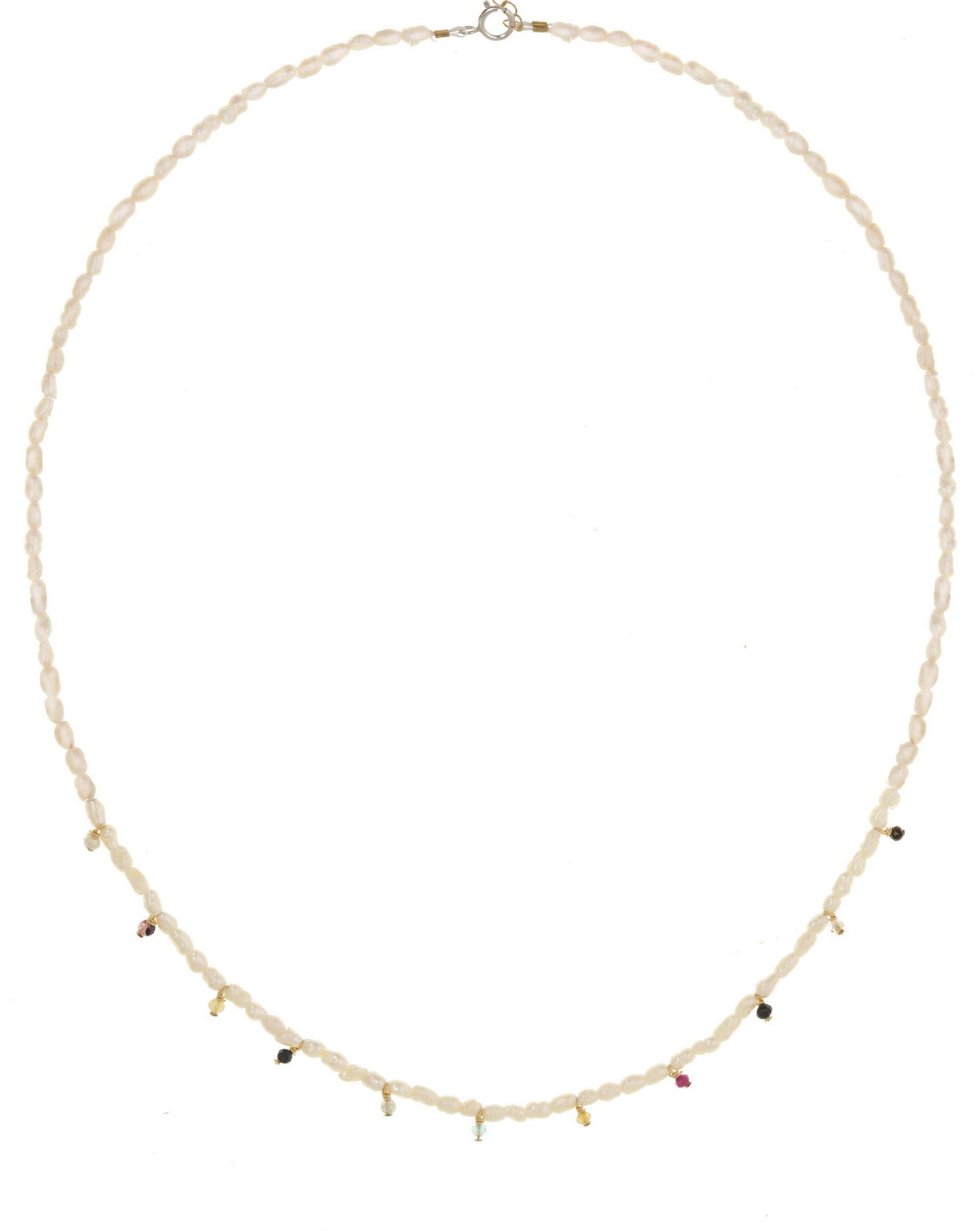 Fiesta Necklace by KOZAKH. A 16 to 18 inch long strand of Freshwater Rice Pearl necklace, crafted in 14K Gold Filled, featuring Aquamarine, Sapphire, Ruby, and Tourmaline gemstones.