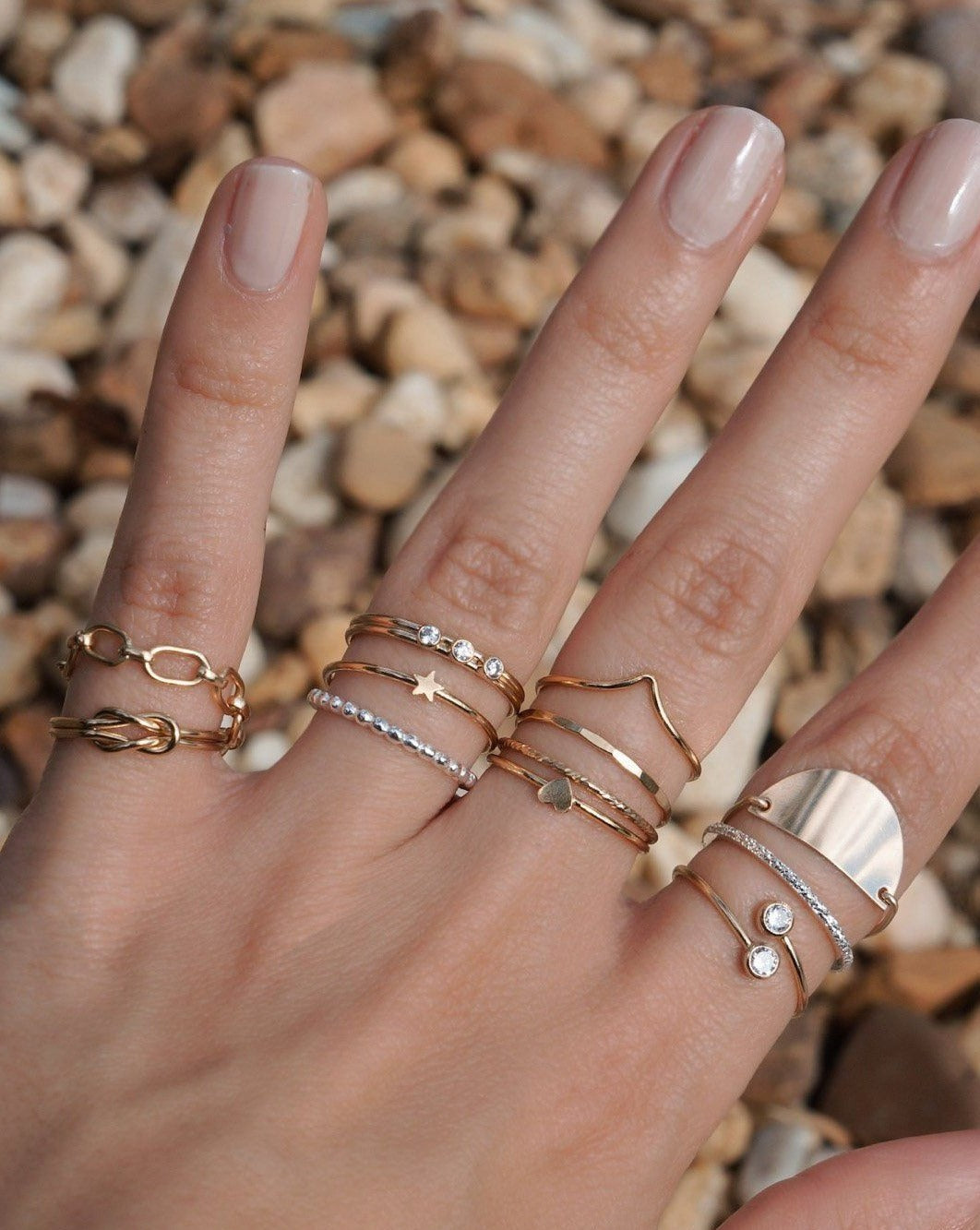 Heart Ring by KOZAKH. A 1mm band, crafted in 14K Gold Filled, featuring a gold heart design.