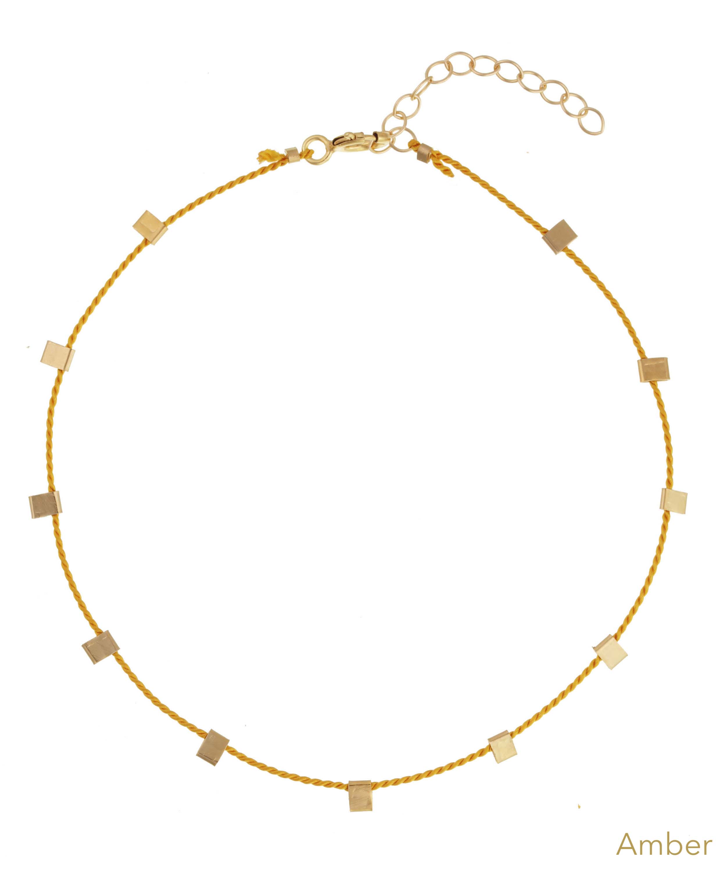 Hilo Bracelet by KOZAKH. A 6 to 7 inch adjustable length natural silk thread bracelet, embellished with 14K Gold Filled metals.