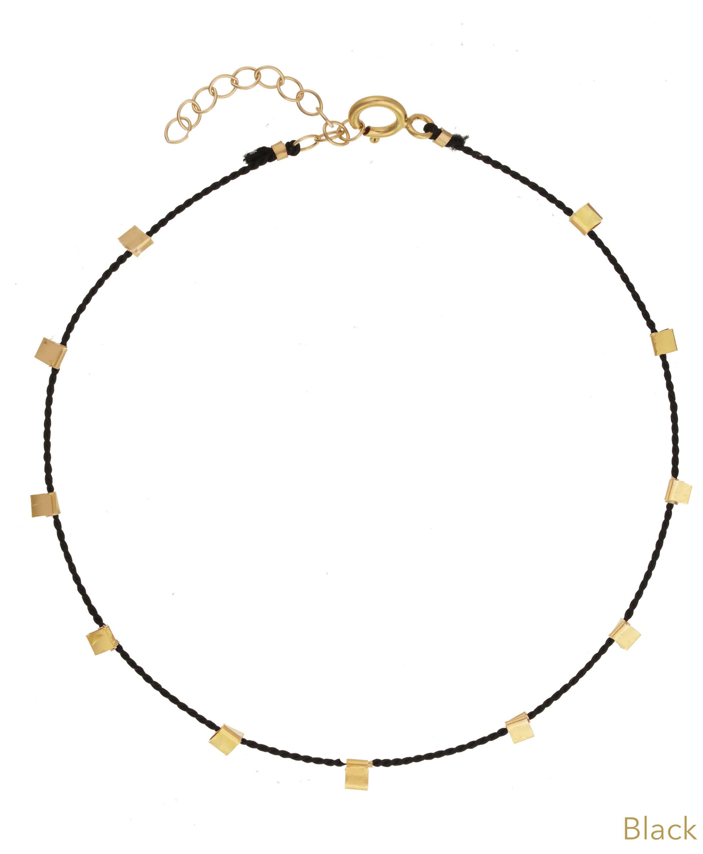 Hilo Bracelet by KOZAKH. A 6 to 7 inch adjustable length natural silk thread bracelet, embellished with 14K Gold Filled metals.