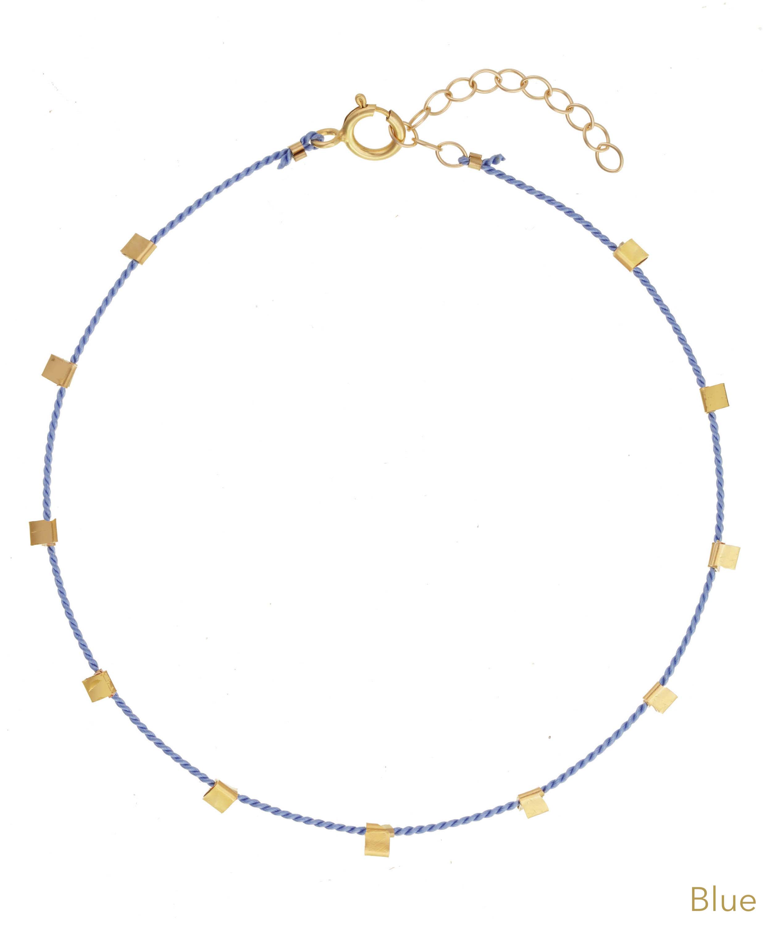 Hilo Bracelet by KOZAKH. A 6 to 7 inch adjustable length natural silk thread bracelet, embellished with 14K Gold Filled metals.