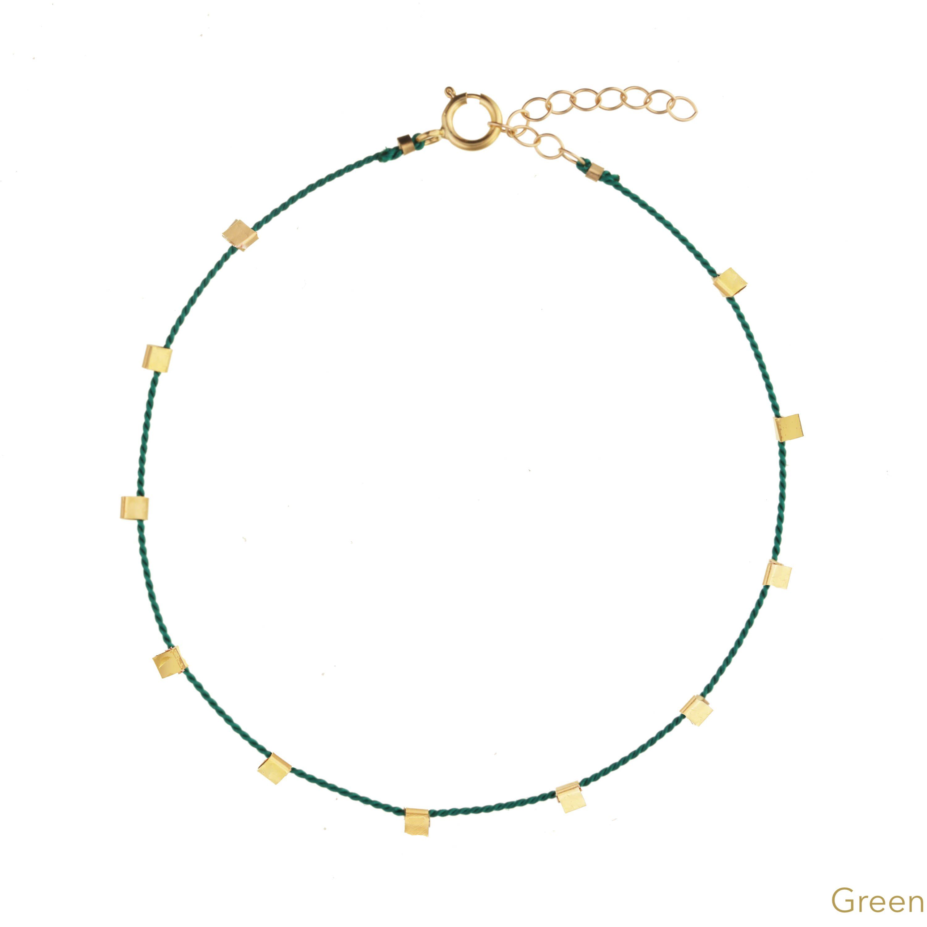 Hilo Bracelet by KOZAKH. A 6 to 7 inch adjustable length natural silk thread bracelet, embellished with 14K Gold Filled metals.