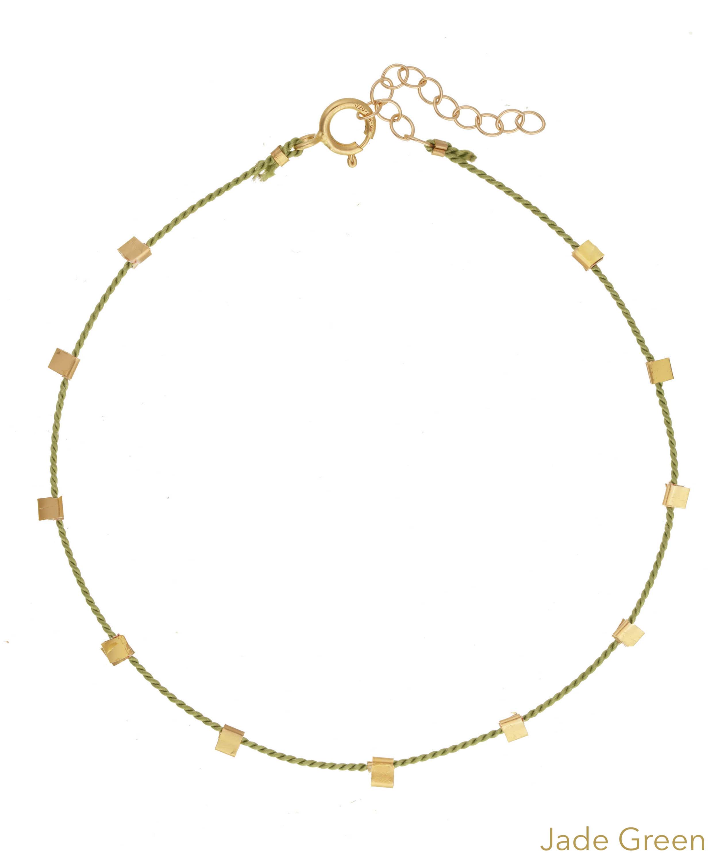 Hilo Bracelet by KOZAKH. A 6 to 7 inch adjustable length natural silk thread bracelet, embellished with 14K Gold Filled metals.