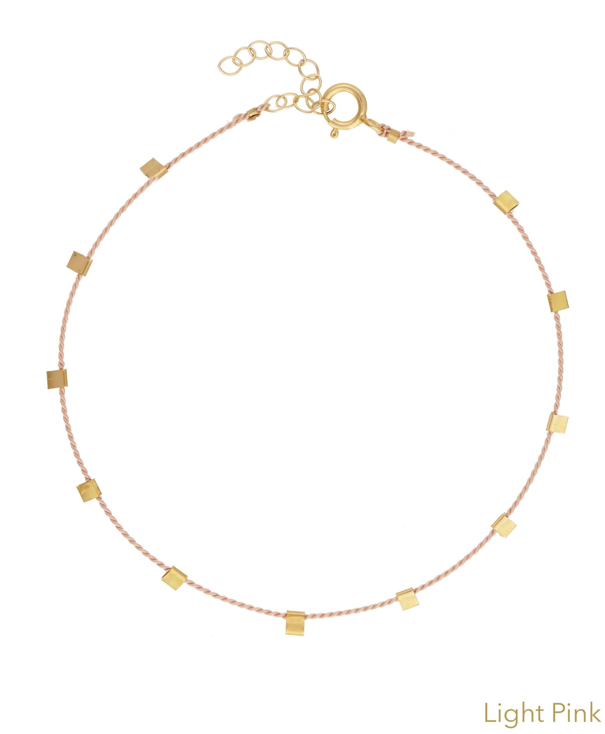 Hilo Bracelet by KOZAKH. A 6 to 7 inch adjustable length natural silk thread bracelet, embellished with 14K Gold Filled metals.