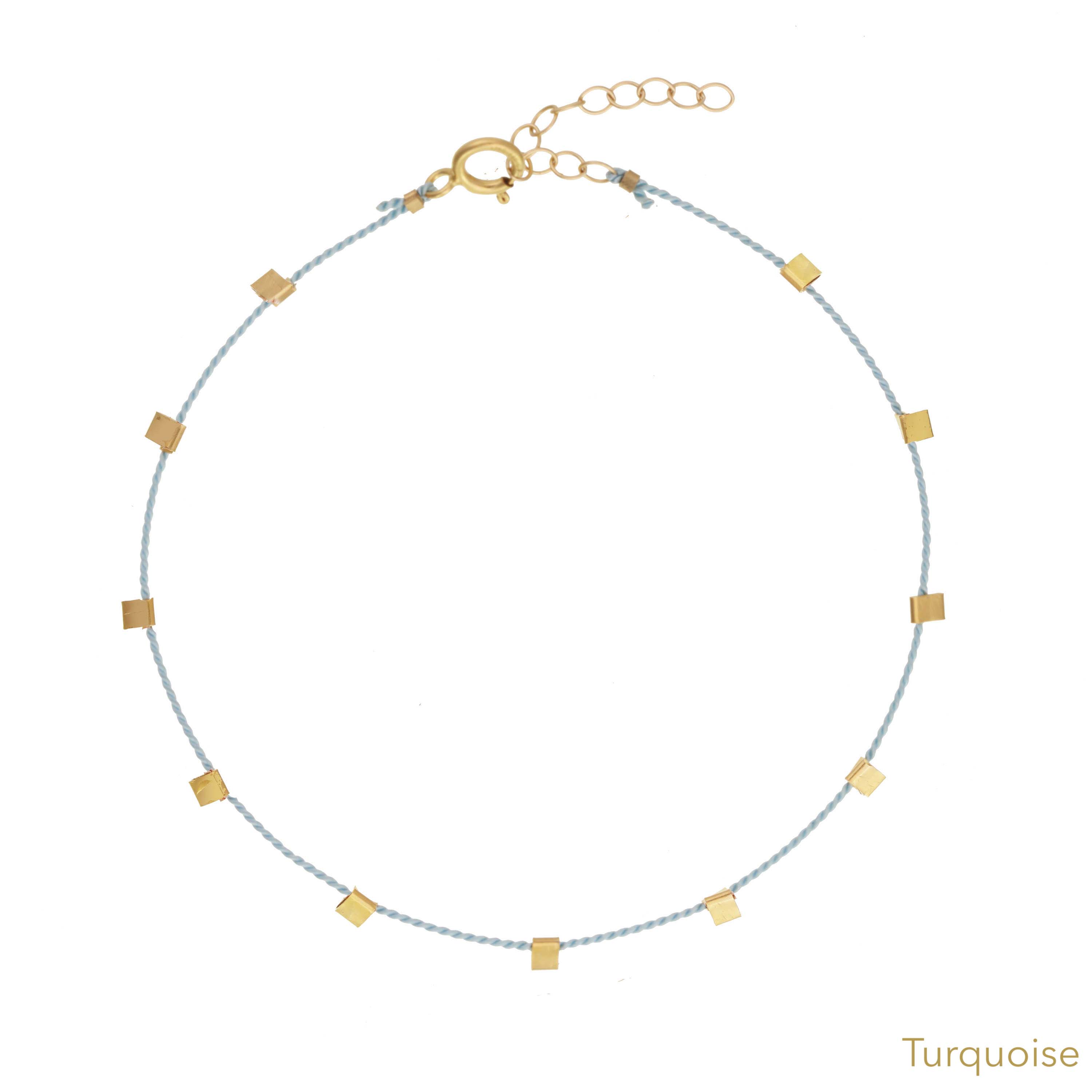 Hilo Bracelet by KOZAKH. A 6 to 7 inch adjustable length natural silk thread bracelet, embellished with 14K Gold Filled metals.