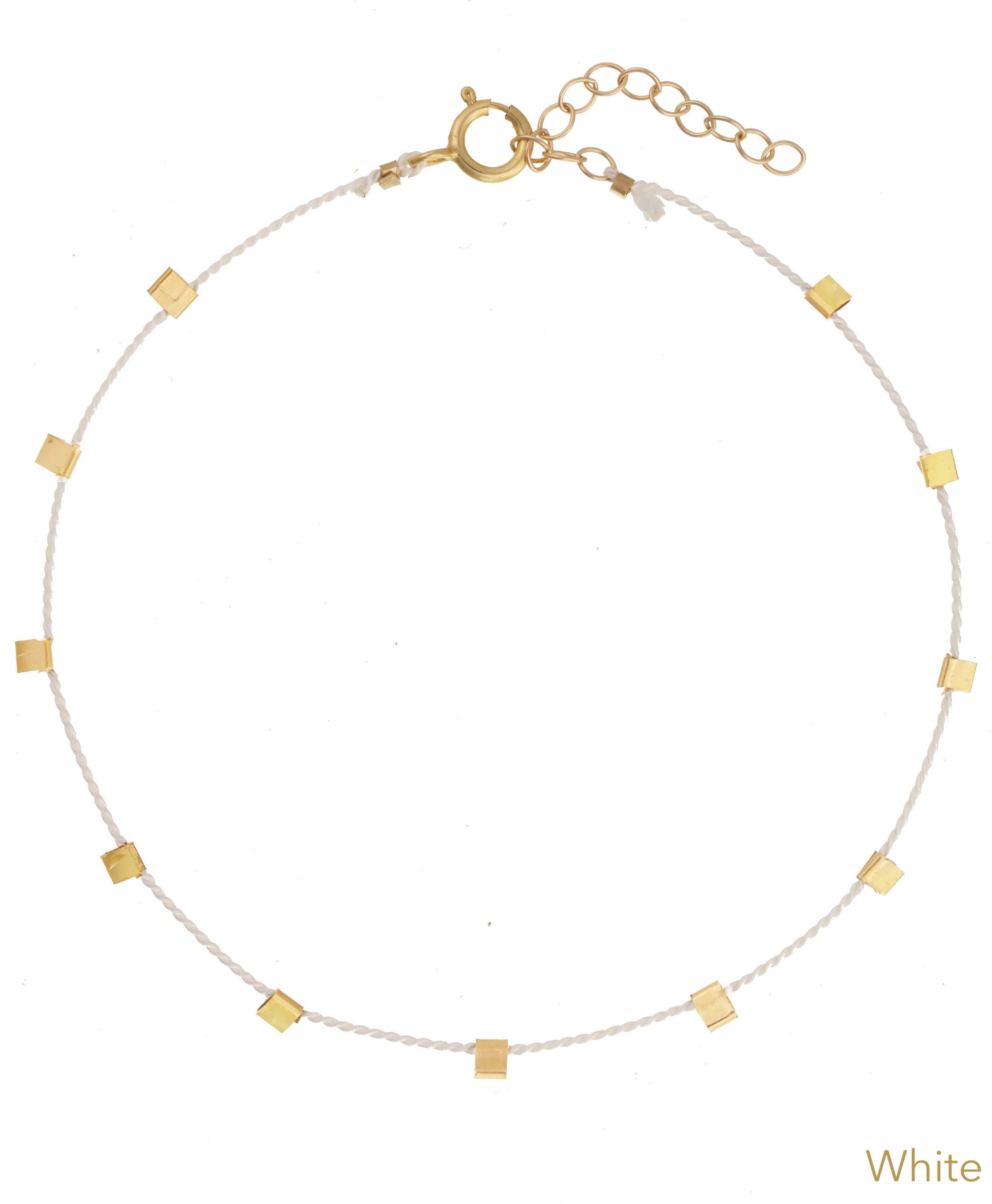 Hilo Bracelet by KOZAKH. A 6 to 7 inch adjustable length natural silk thread bracelet, embellished with 14K Gold Filled metals.