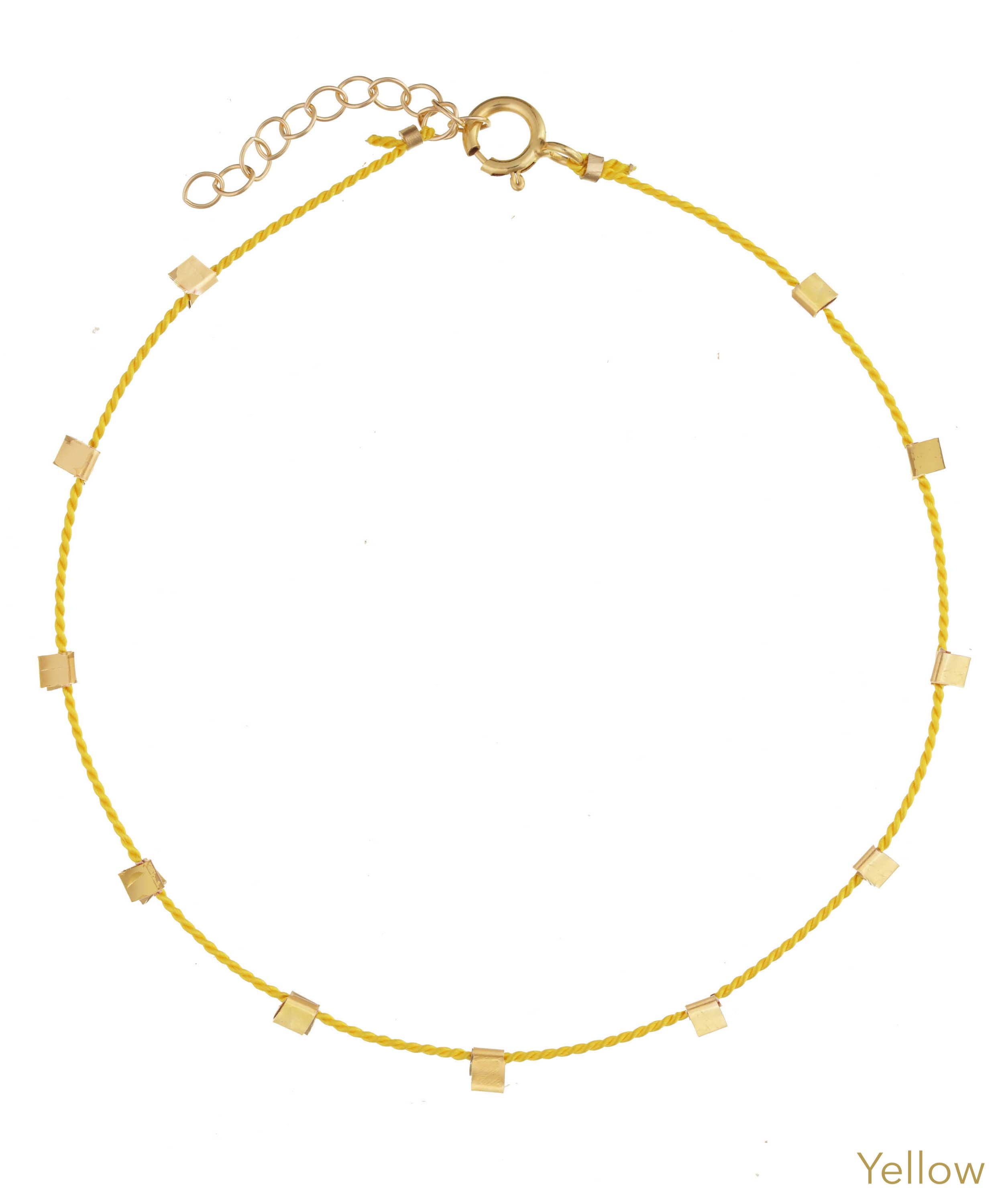 Hilo Bracelet by KOZAKH. A 6 to 7 inch adjustable length natural silk thread bracelet, embellished with 14K Gold Filled metals.