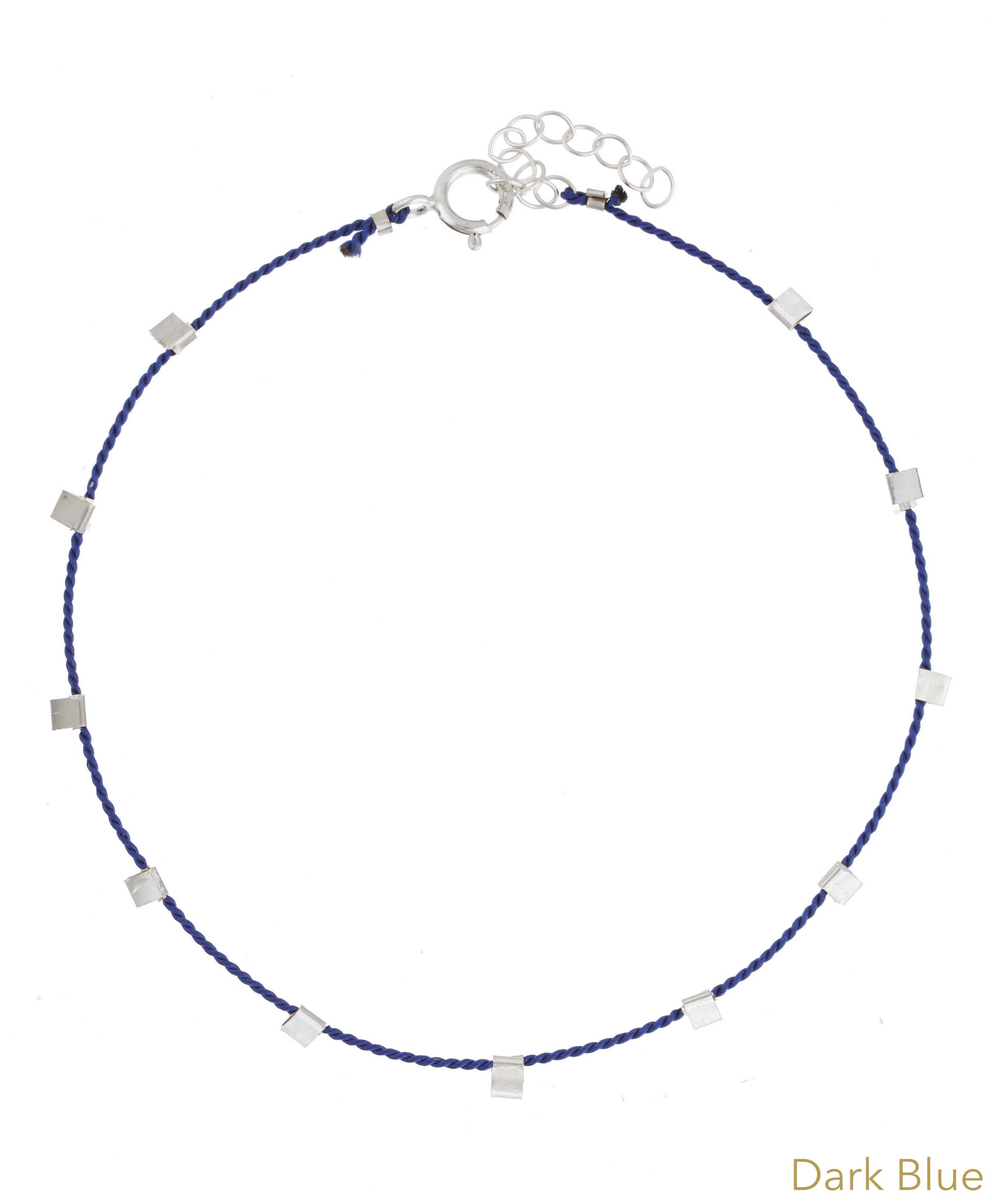 Hilo Bracelet by KOZAKH. A 6 to 7 inch adjustable length natural silk thread bracelet, embellished with Sterling Silver metals.