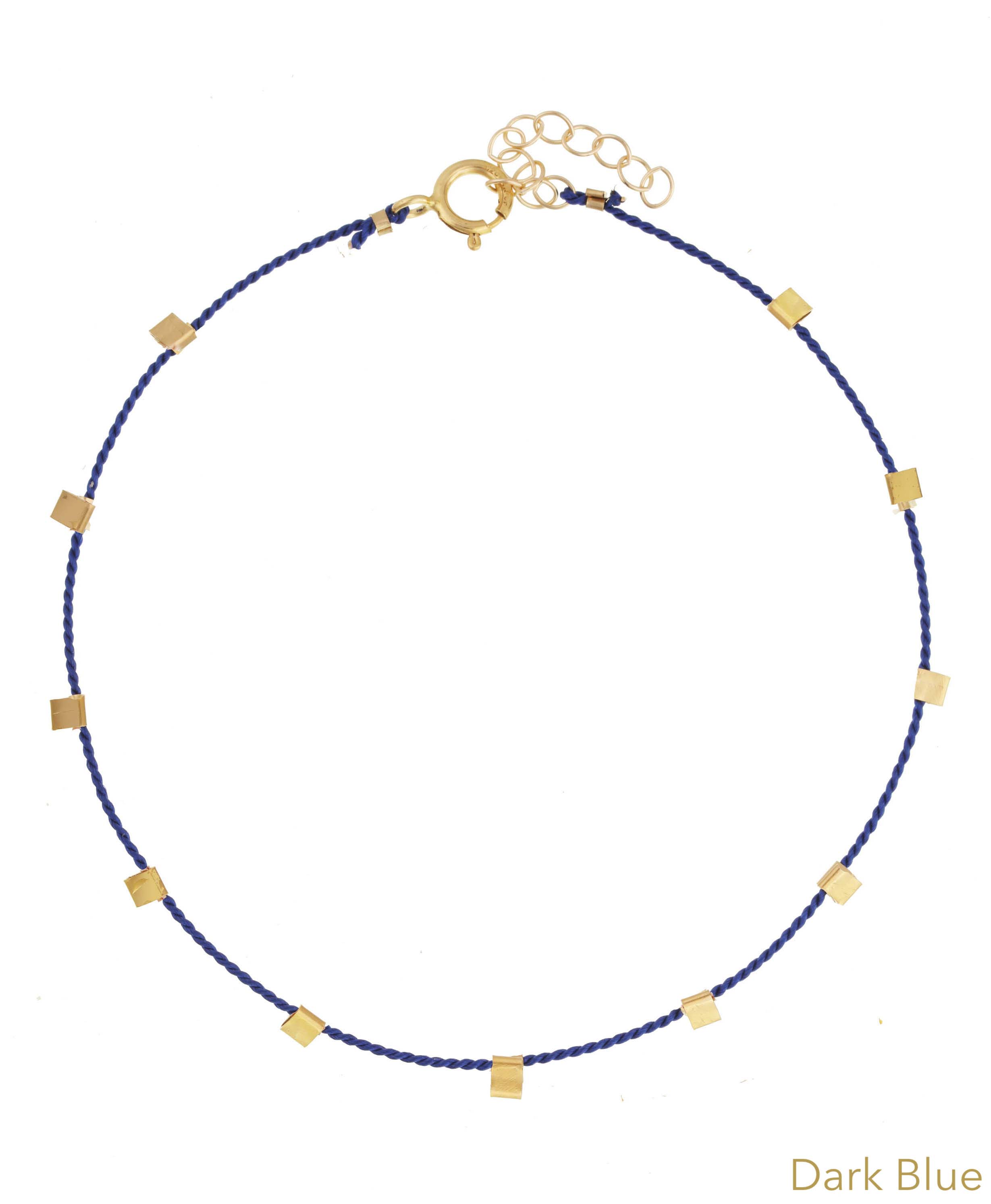 Hilo Bracelet by KOZAKH. A 6 to 7 inch adjustable length natural silk thread bracelet, embellished with 14K Gold Filled metals.