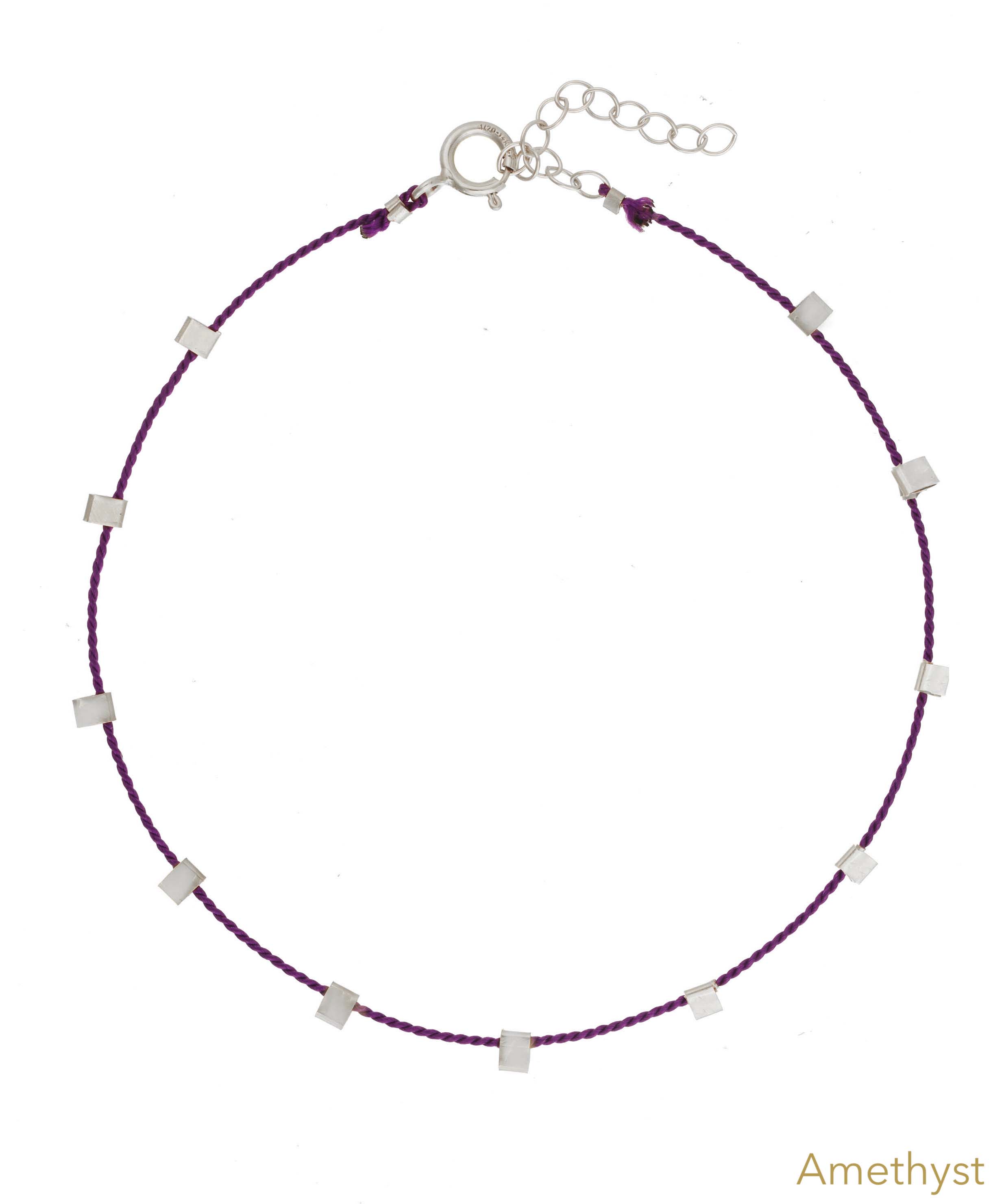 Hilo Bracelet by KOZAKH. A 6 to 7 inch adjustable length natural silk thread bracelet, embellished with Sterling Silver metals.