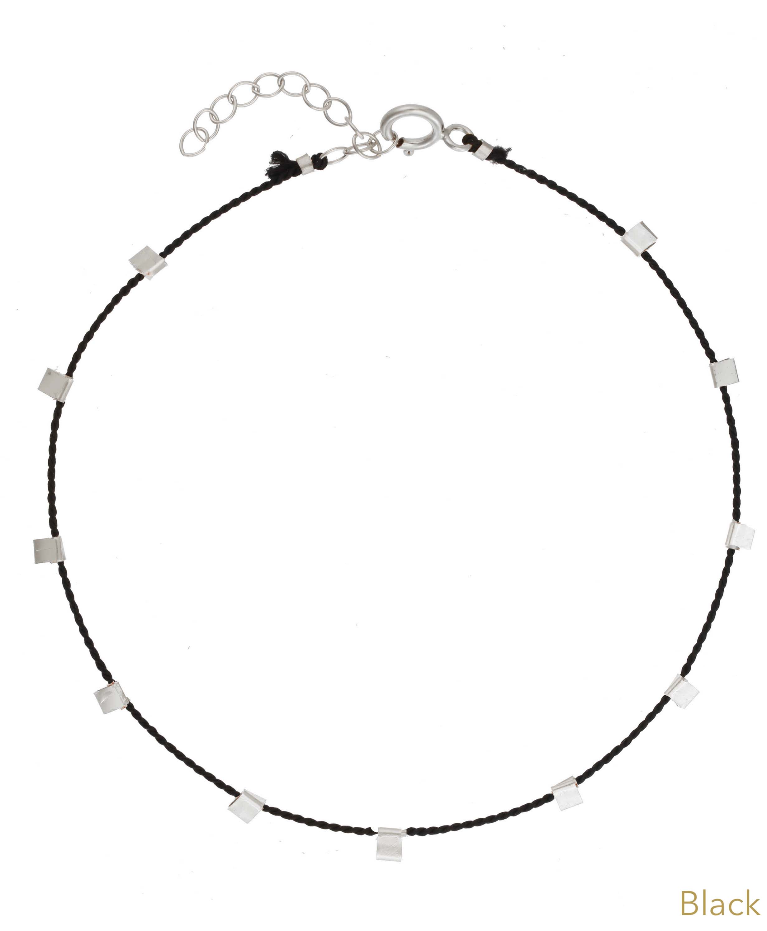 Hilo Bracelet by KOZAKH. A 6 to 7 inch adjustable length natural silk thread bracelet, embellished with Sterling Silver metals.