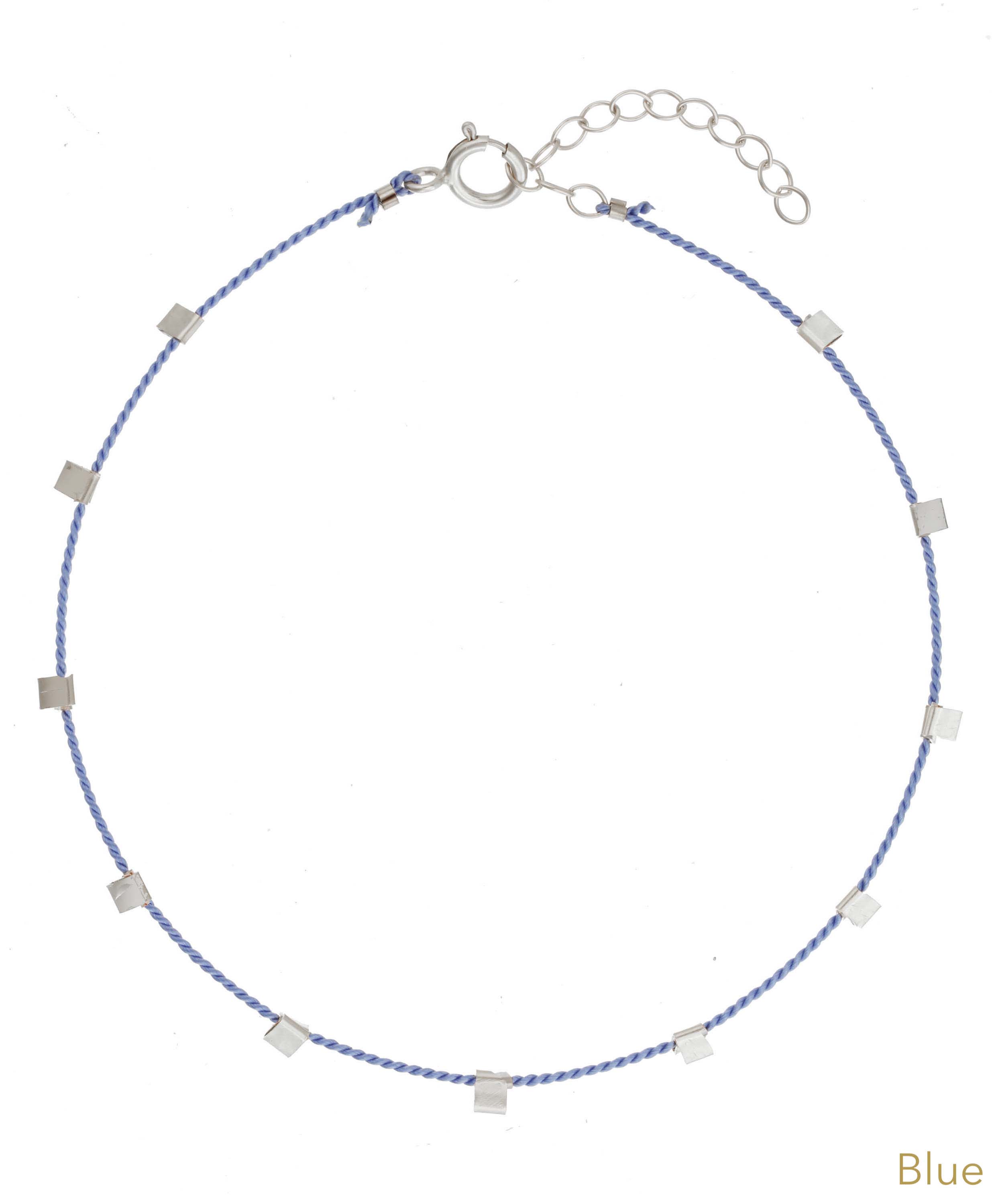 Hilo Bracelet by KOZAKH. A 6 to 7 inch adjustable length natural silk thread bracelet, embellished with Sterling Silver metals.