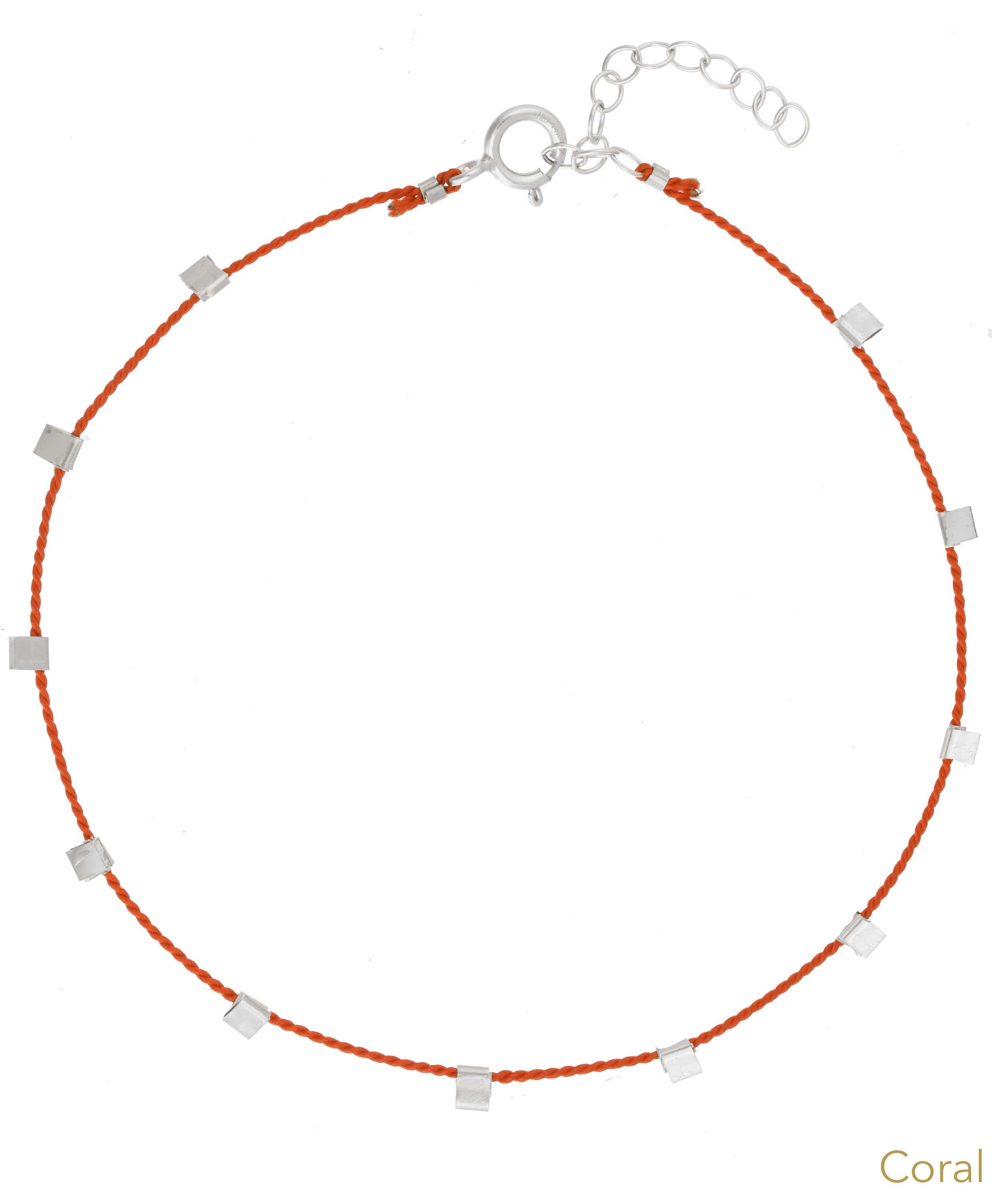 Hilo Bracelet by KOZAKH. A 6 to 7 inch adjustable length natural silk thread bracelet, embellished with Sterling Silver metals.