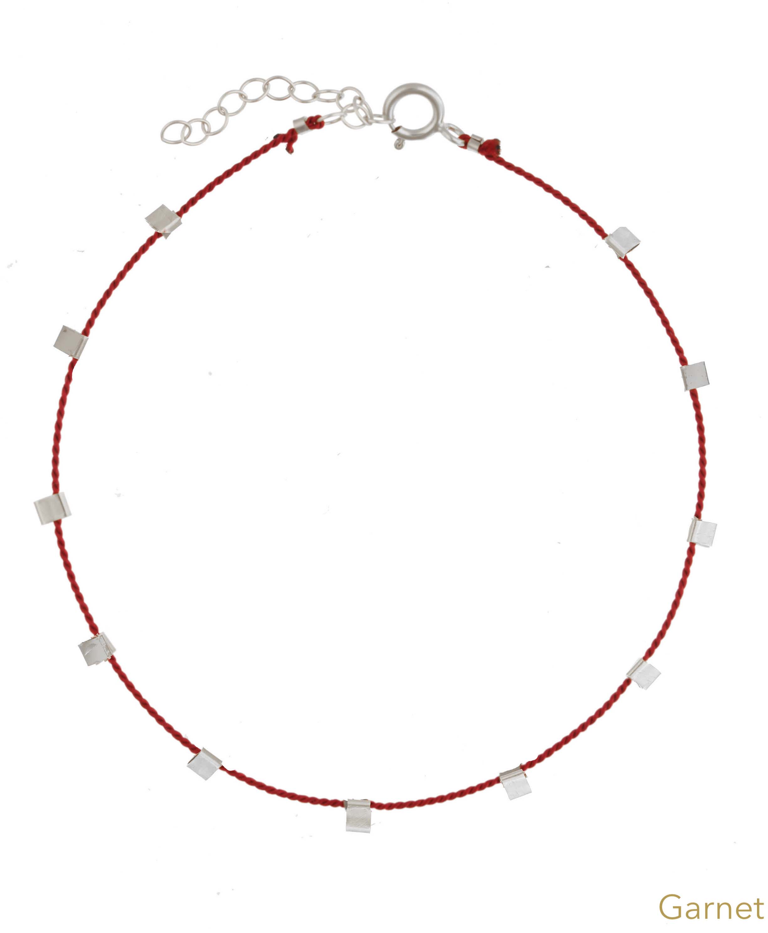 Hilo Bracelet by KOZAKH. A 6 to 7 inch adjustable length natural silk thread bracelet, embellished with Sterling Silver metals.