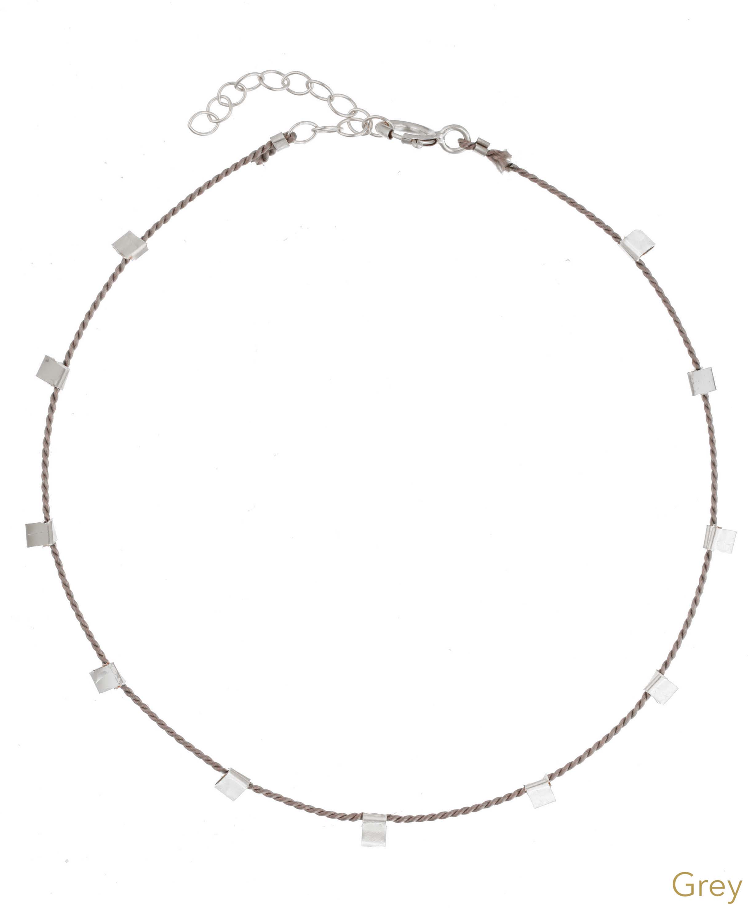 Hilo Bracelet by KOZAKH. A 6 to 7 inch adjustable length natural silk thread bracelet, embellished with Sterling Silver metals.