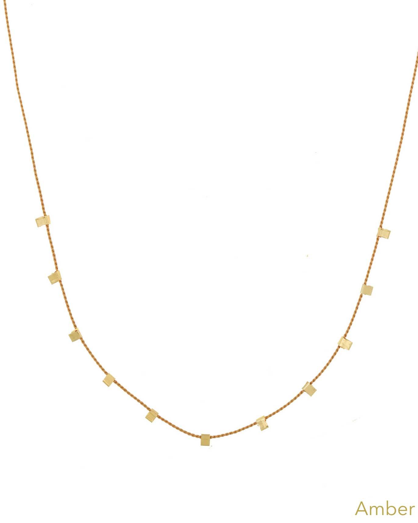Hilo Necklace by KOZAKH. A 16 inch long natural silk thread necklace, embellished with 14K Gold Filled square cut metals.