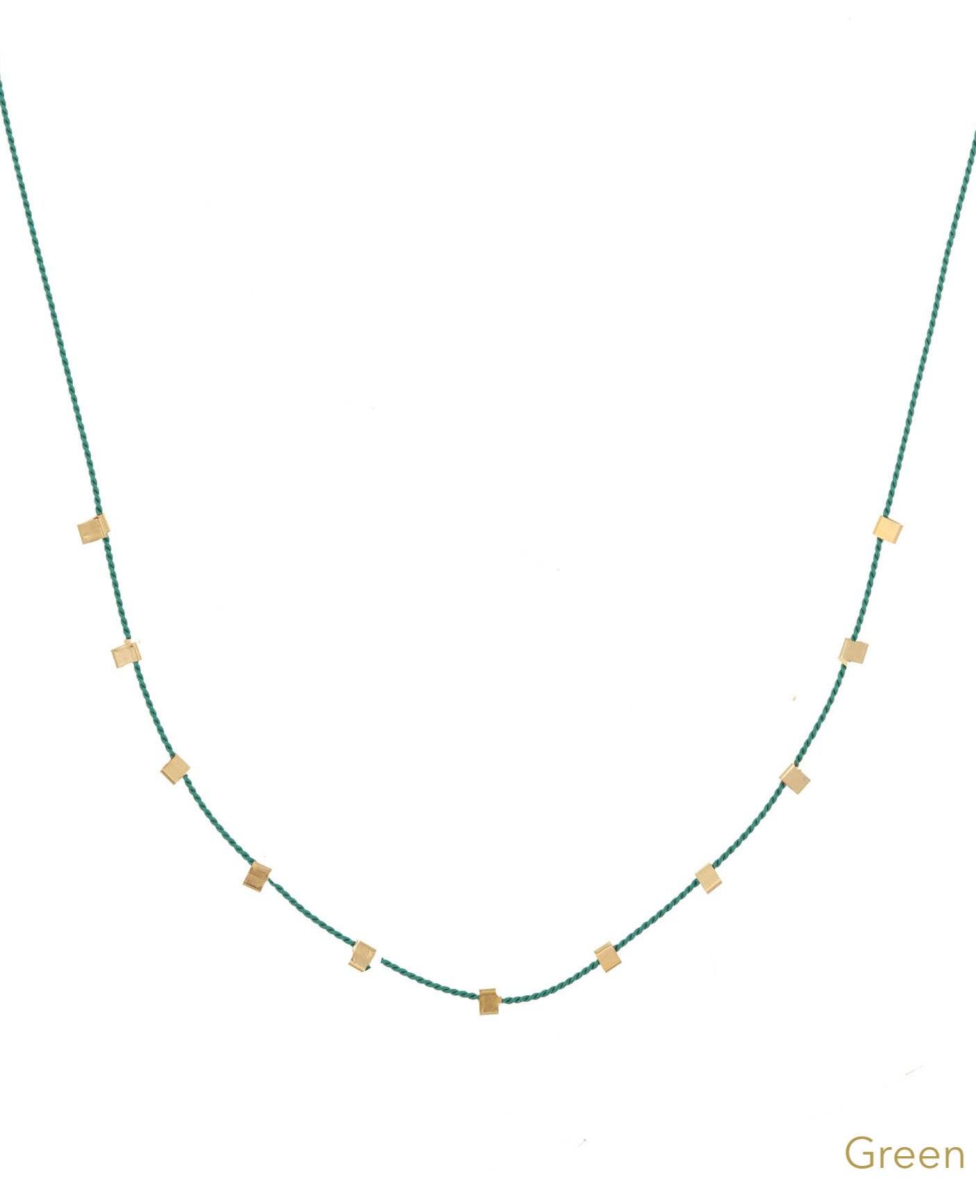 Hilo Necklace by KOZAKH. A 16 inch long natural silk thread necklace, embellished with 14K Gold Filled square cut metals.