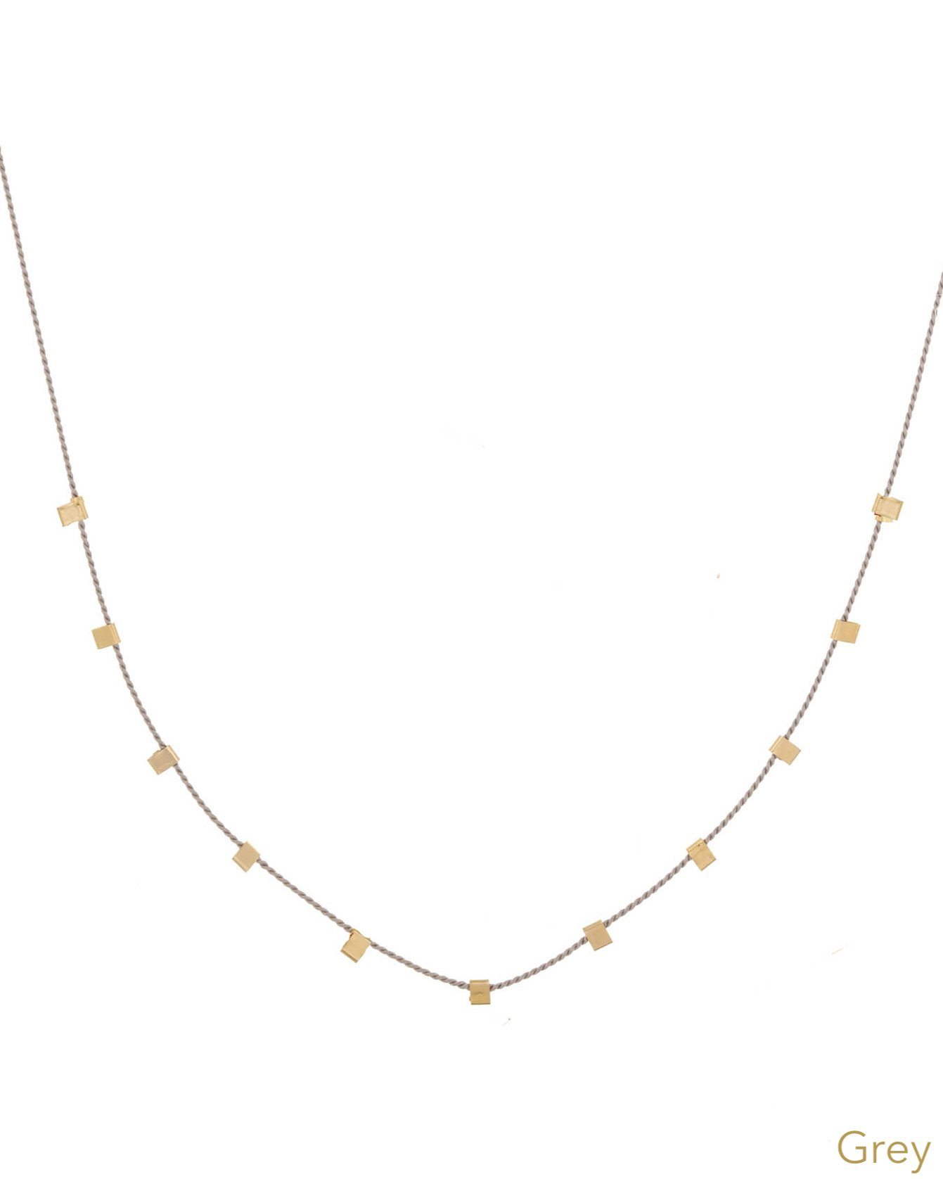 Hilo Necklace by KOZAKH. A 16 inch long natural silk thread necklace, embellished with 14K Gold Filled square cut metals.