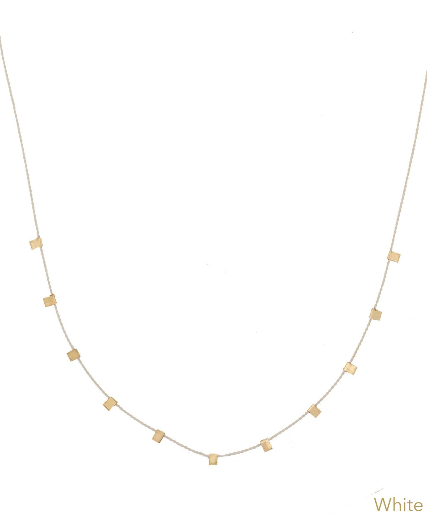 Hilo Necklace by KOZAKH. A 16 inch long natural silk thread necklace, embellished with 14K Gold Filled square cut metals.