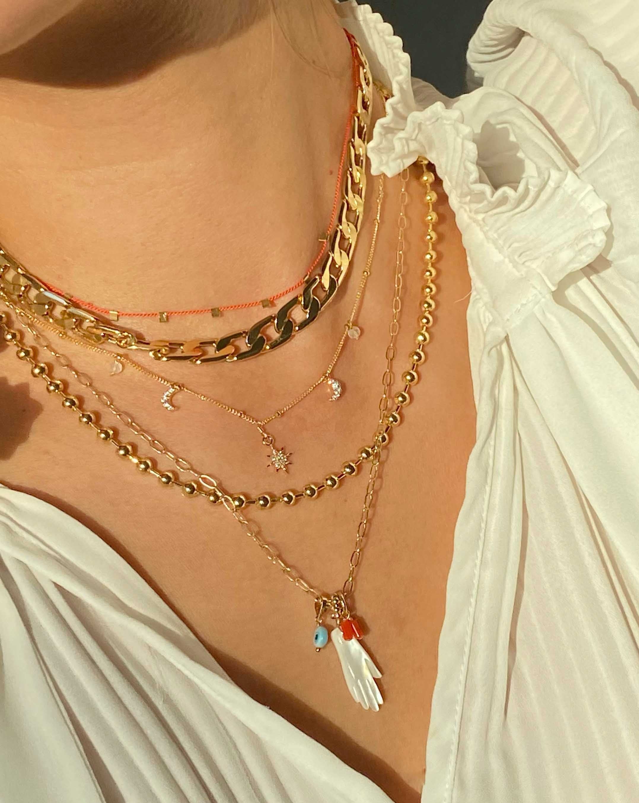 Hilo Necklace by KOZAKH. A 16 inch long natural silk thread necklace, embellished with 14K Gold Filled square cut metals.