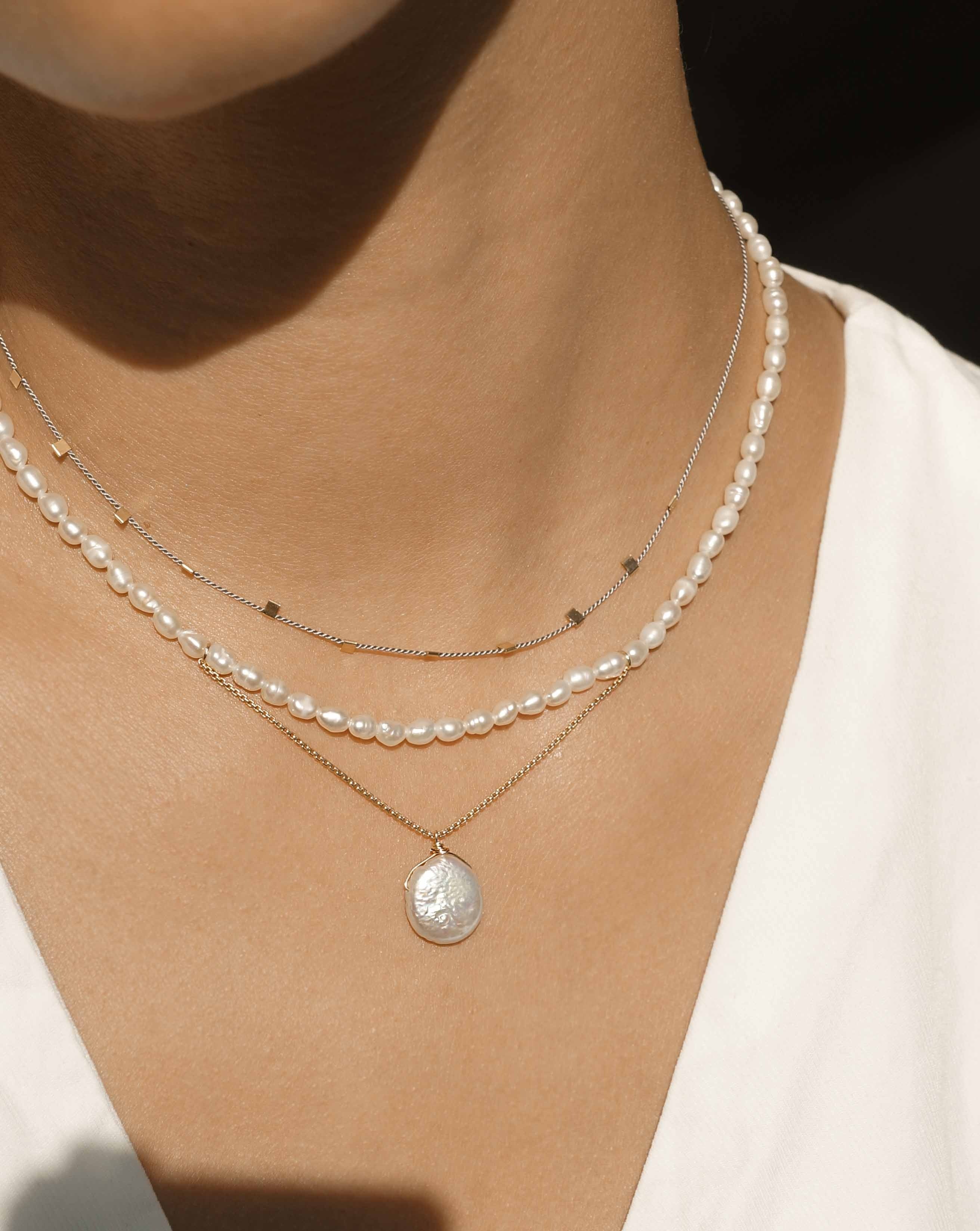 Hilo Necklace by KOZAKH. A 16 inch long natural silk thread necklace, embellished with 14K Gold Filled square cut metals.