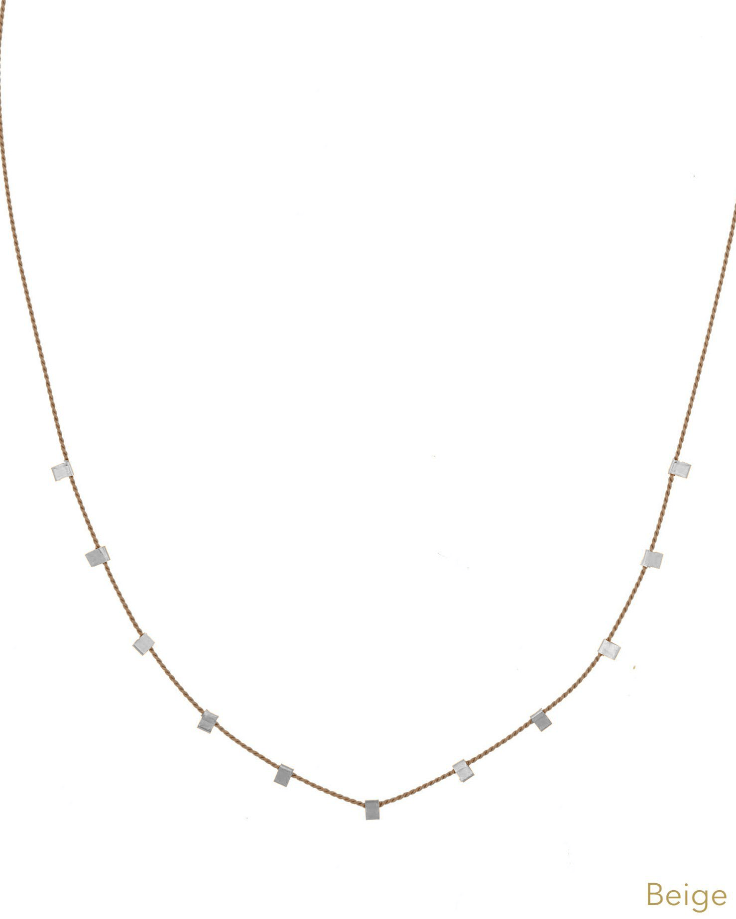 Hilo Necklace by KOZAKH. A 16 inch long natural silk thread necklace, embellished with Sterling Silver square cut metals.