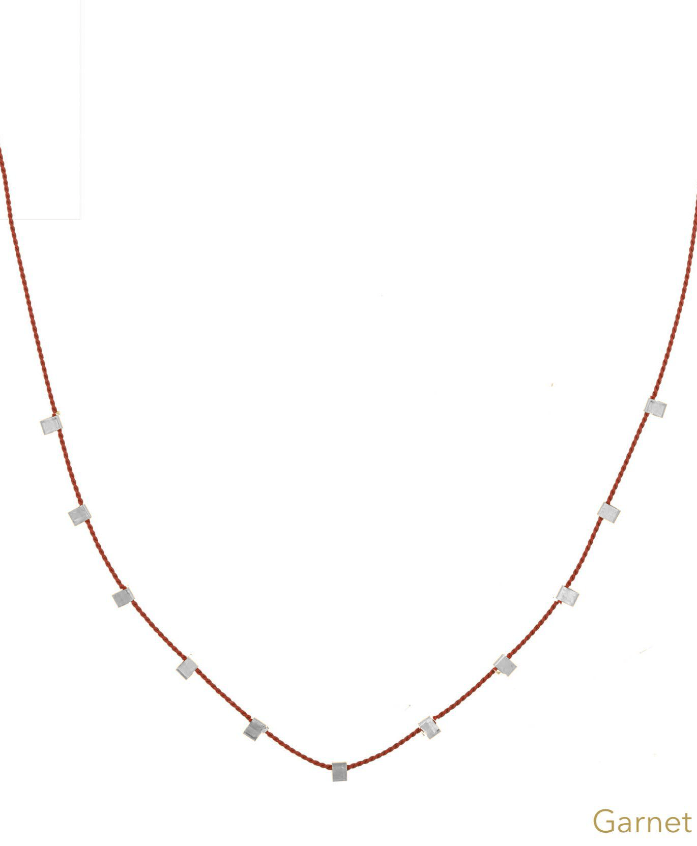 Hilo Necklace by KOZAKH. A 16 inch long natural silk thread necklace, embellished with Sterling Silver square cut metals.