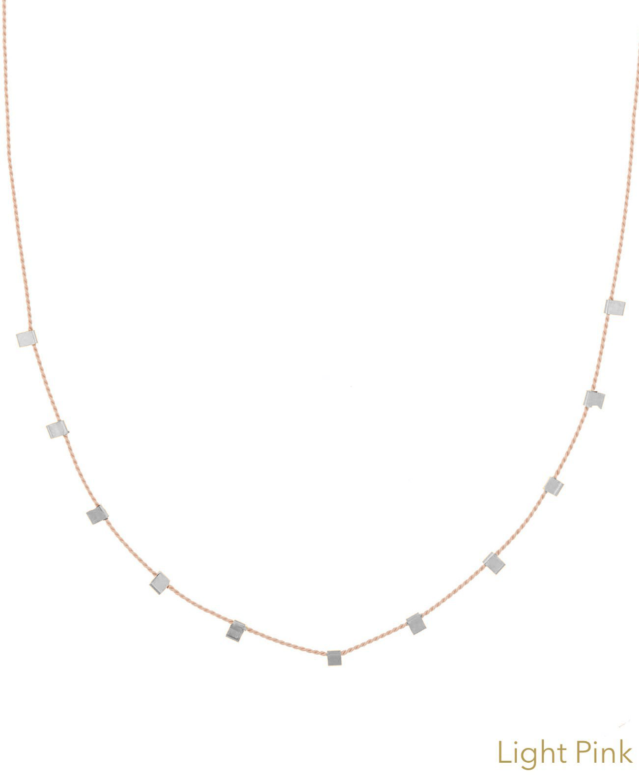 Hilo Necklace by KOZAKH. A 16 inch long natural silk thread necklace, embellished with Sterling Silver square cut metals.