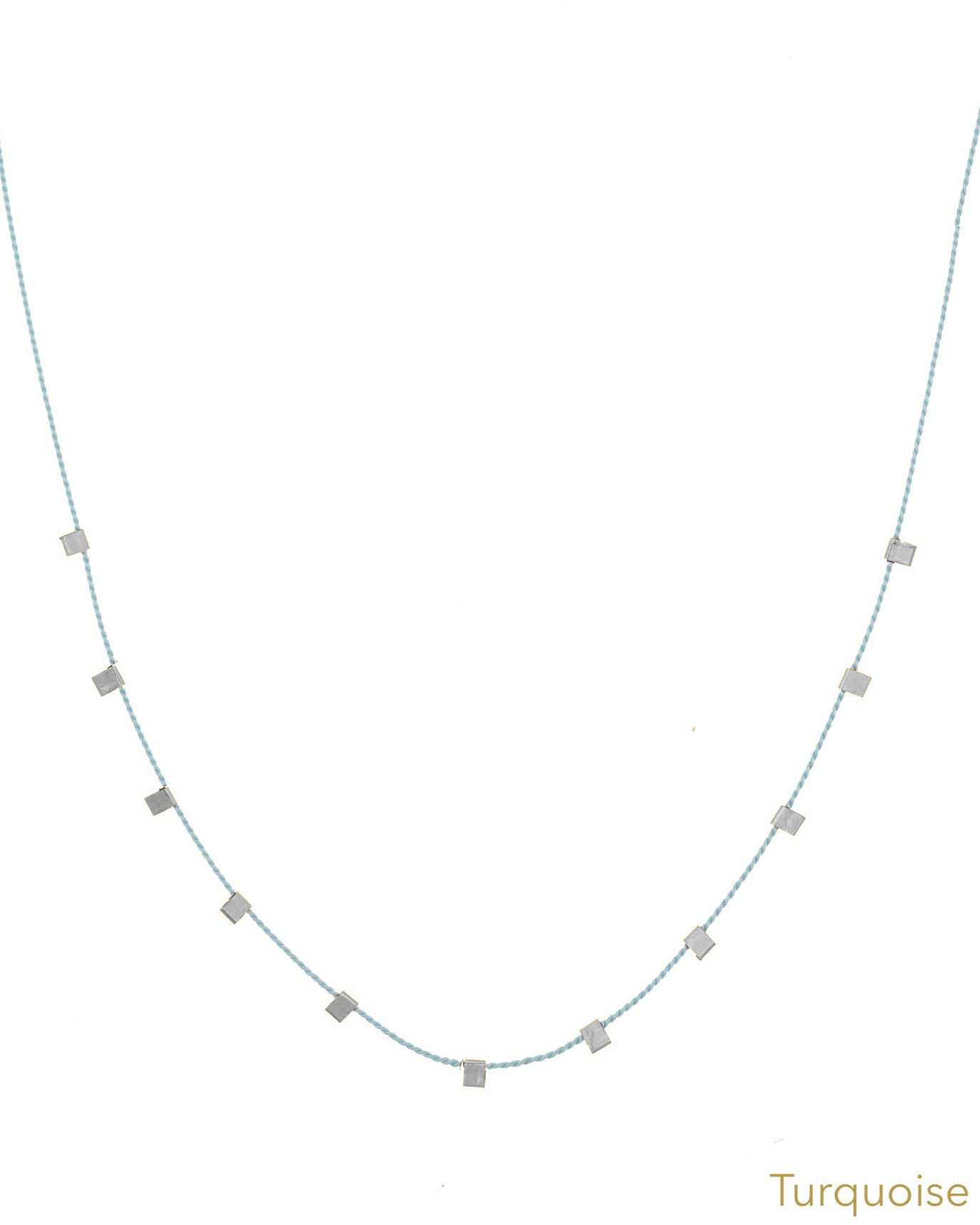 Hilo Necklace by KOZAKH. A 16 inch long natural silk thread necklace, embellished with Sterling Silver square cut metals.