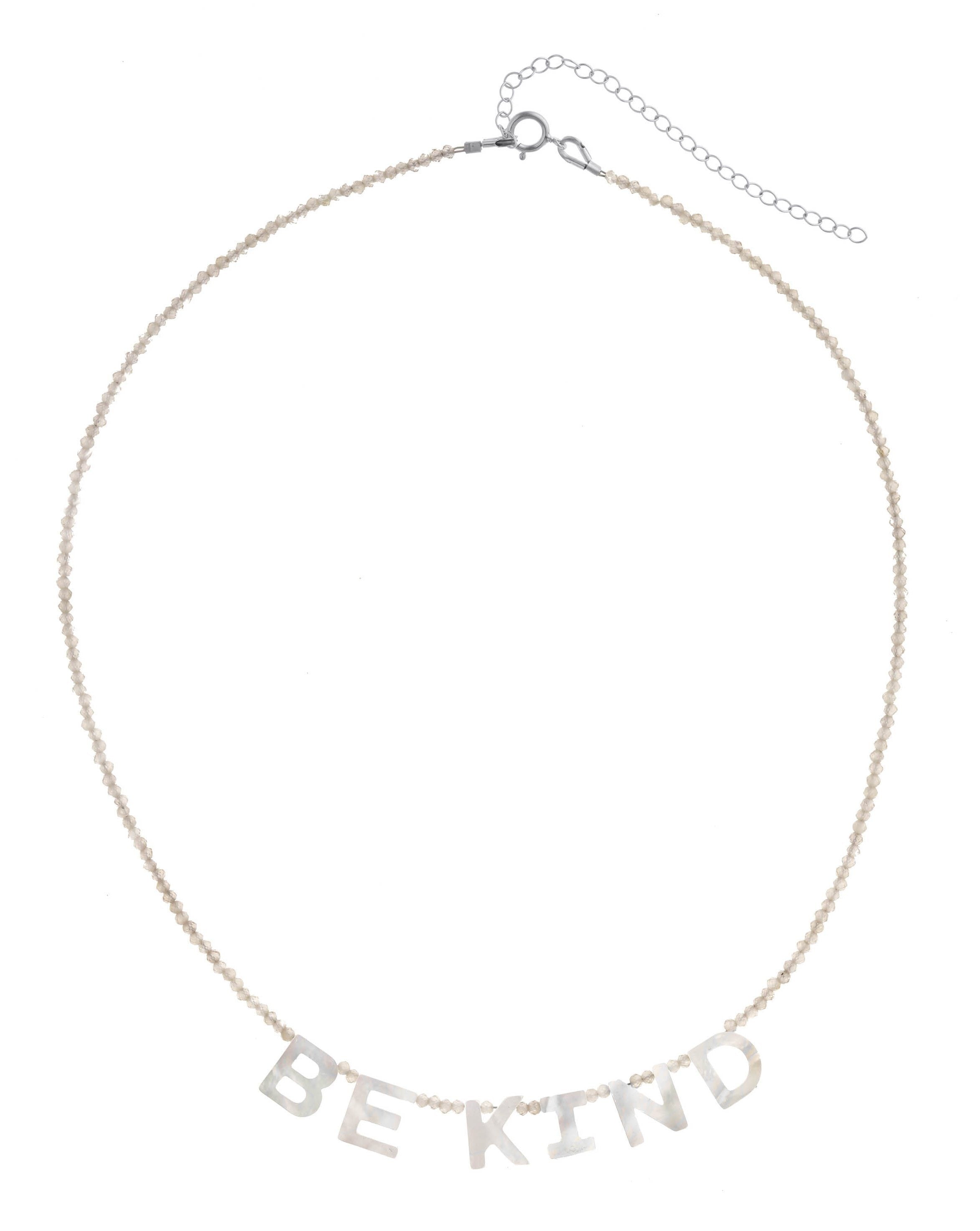 Kind Necklace by KOZAKH. A 16 to 18 inch adjustable length, faceted Zircon beads necklace, crafted with Sterling Silver, featuring hand carved Mother of Pearl letters spelling "BE KIND".
