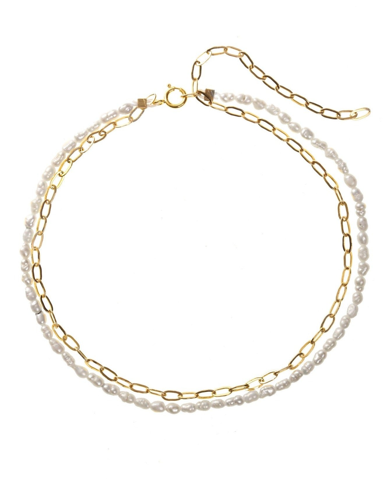 Lamera Anklet by KOZAKH. A 9 to 11 inch adjustable length double anklet. One strand is 14K Gold Filled flat link chain and the other is a strand of 4mm white Rice Pearls.