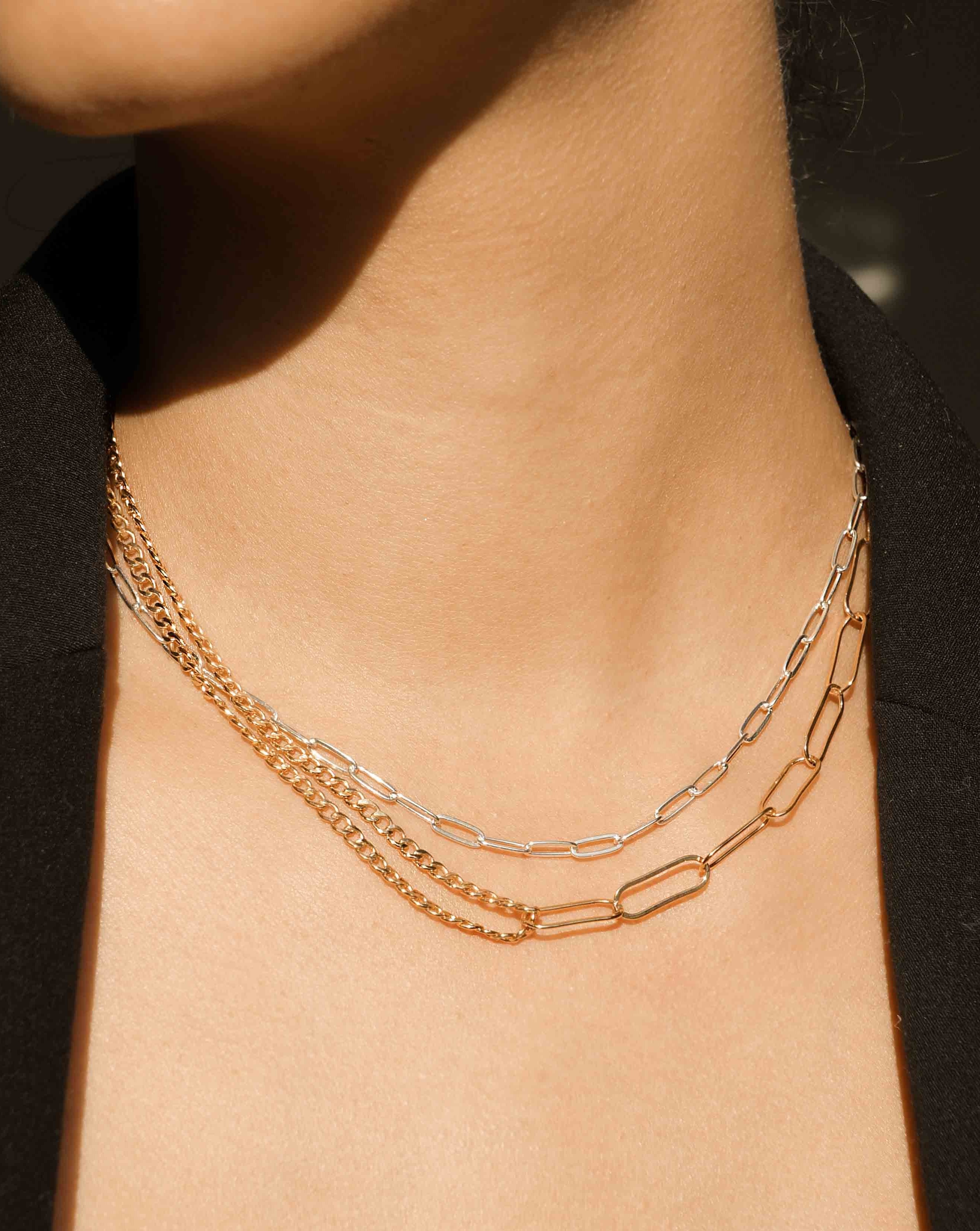 Lilian Necklace by KOZAKH. A 14 to 16 inch adjustable length, combo chain necklace in 14K Gold Filled, with half of it is braided chain and paperclip chain on the other half.
