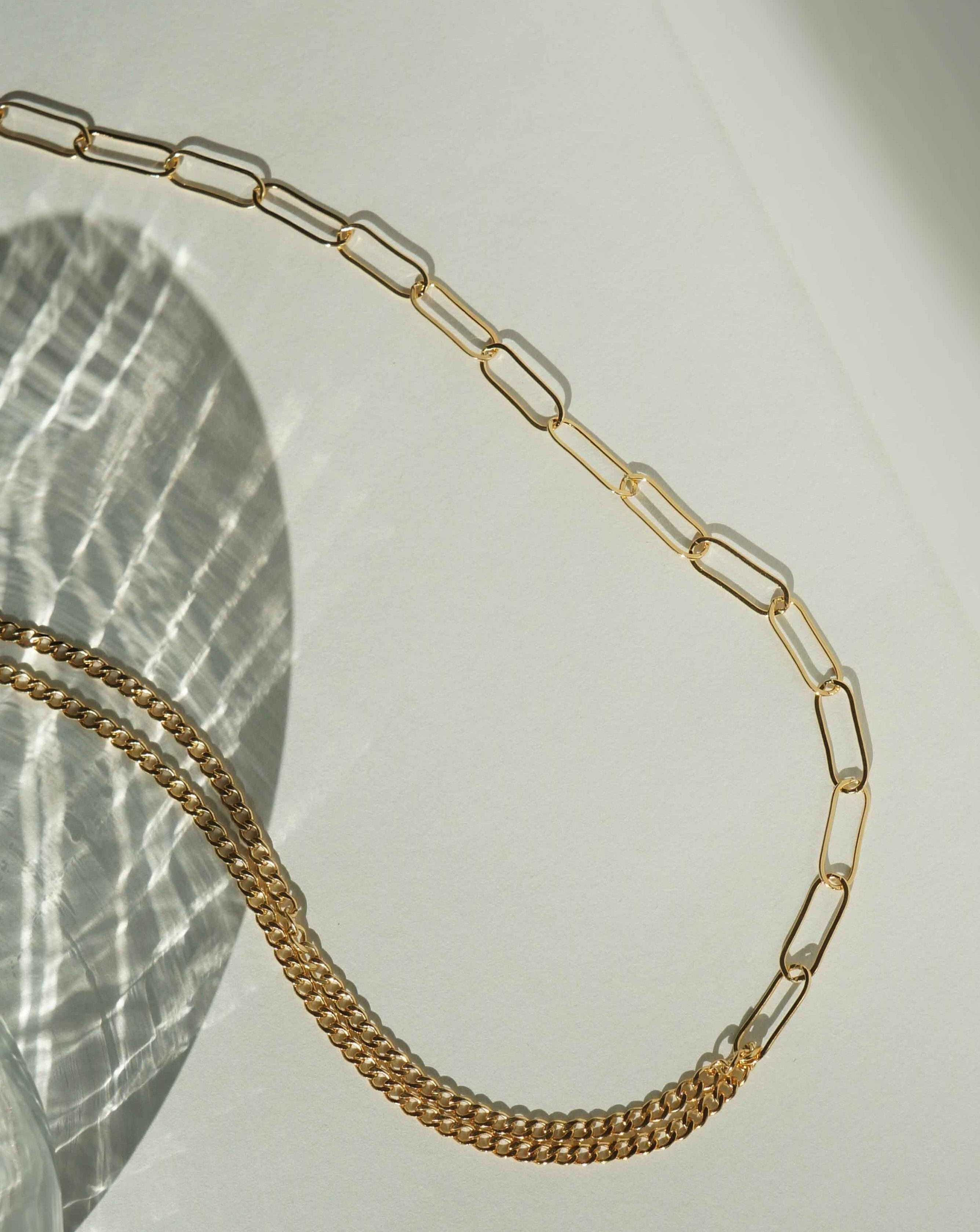 Lilian Necklace by KOZAKH. A 14 to 16 inch adjustable length, combo chain necklace in 14K Gold Filled, with half of it is braided chain and paperclip chain on the other half.