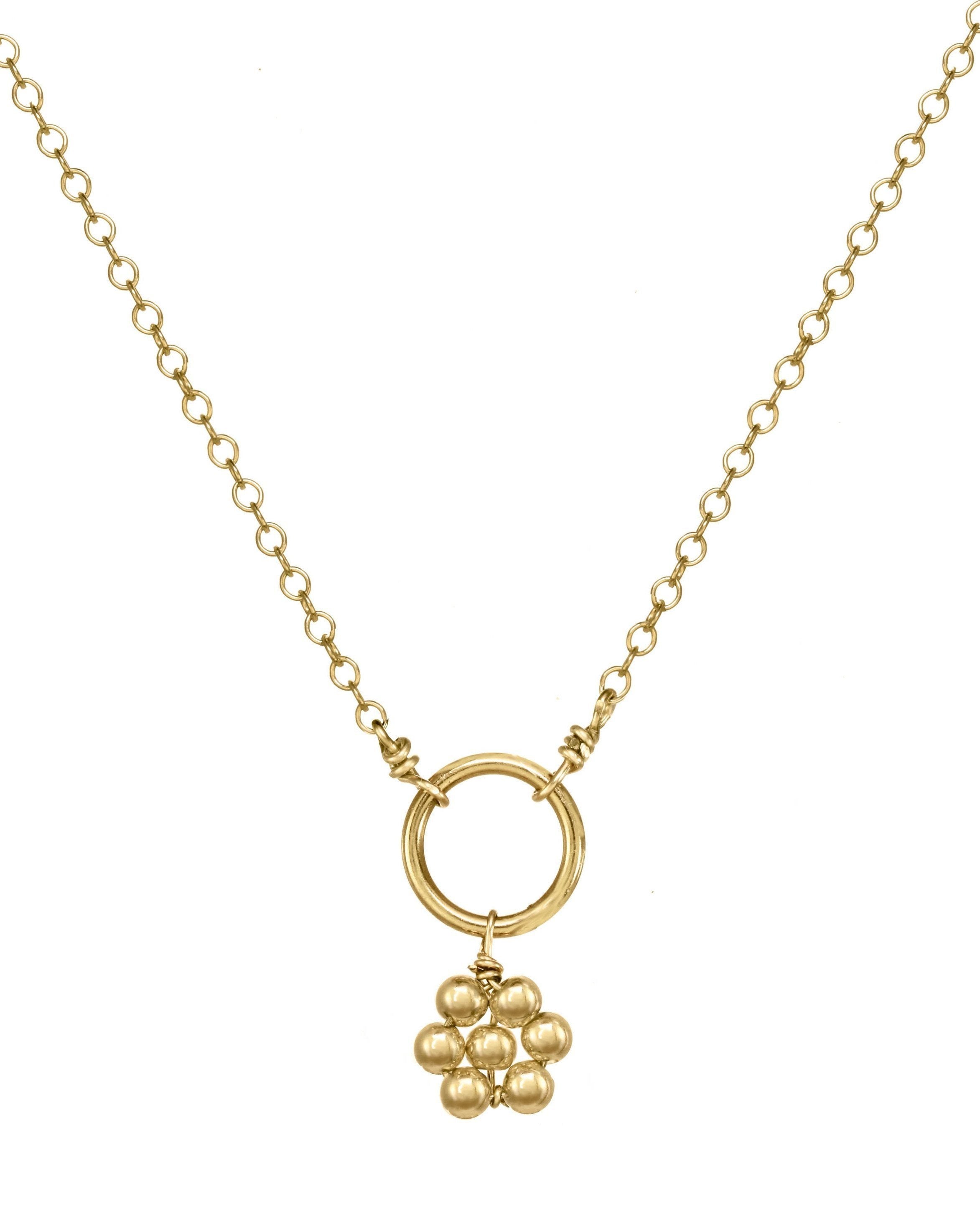 Luella Necklace by KOZAKH. A 16 to 18 inch adjustable length necklace, crafted in 14K Gold Filled, featuring a handmade beaded daisy charm.